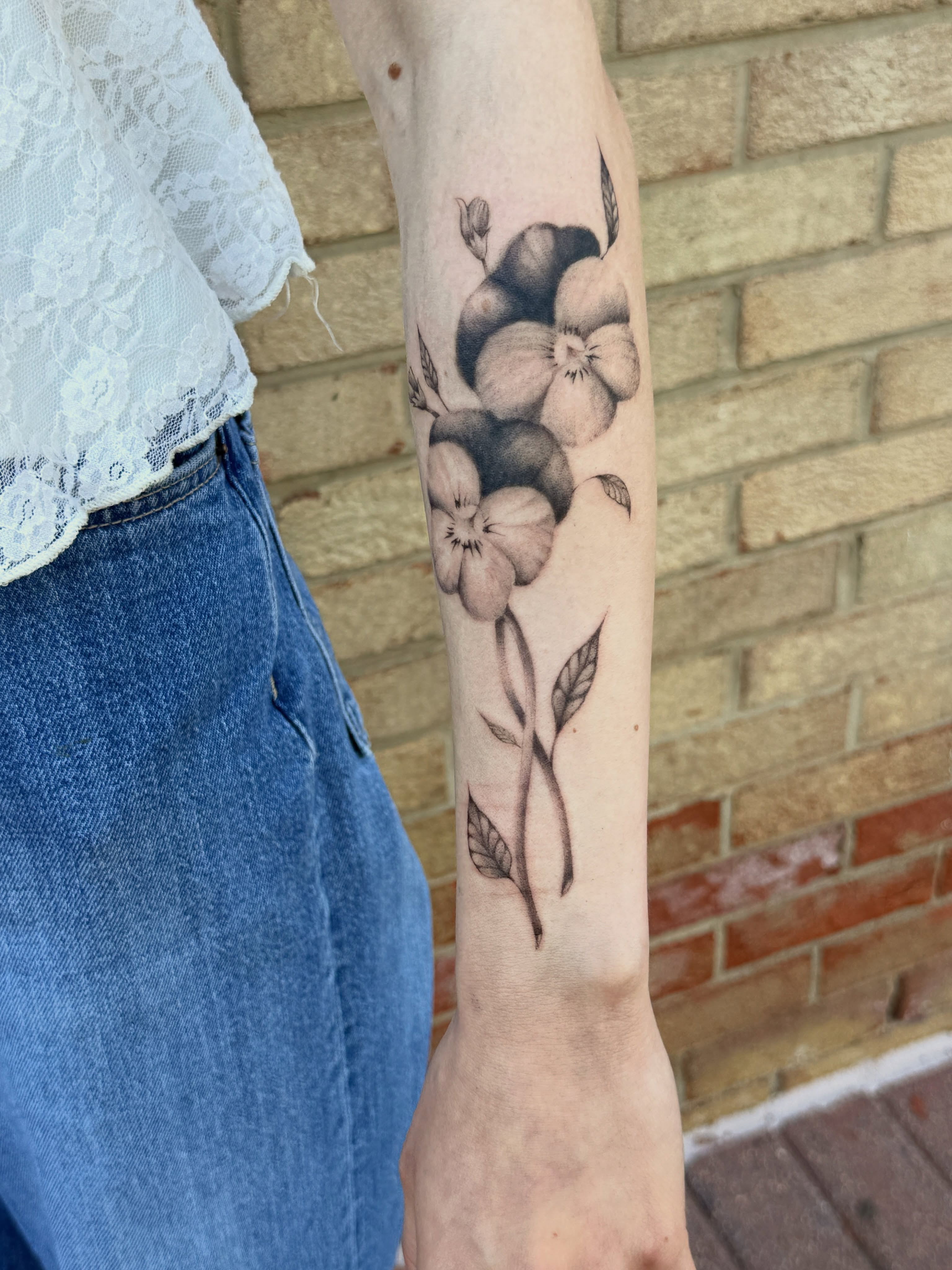 Flower bouquet black and grey tattoo on the forearm by 「 ✦ Sa-Na ✦ 」DMV TATTOO ARTIST