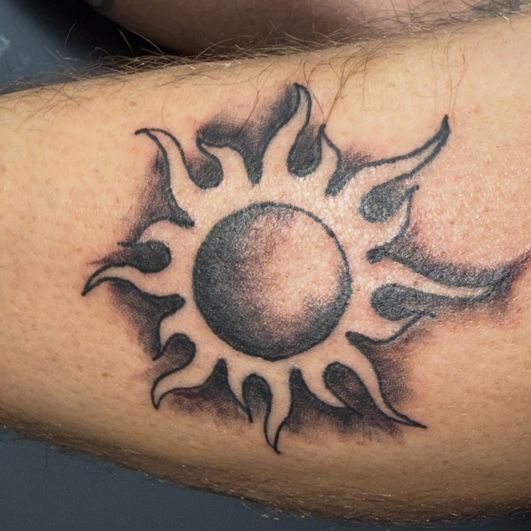 Sun geometric tattoo on the forearm by Addison Bruce