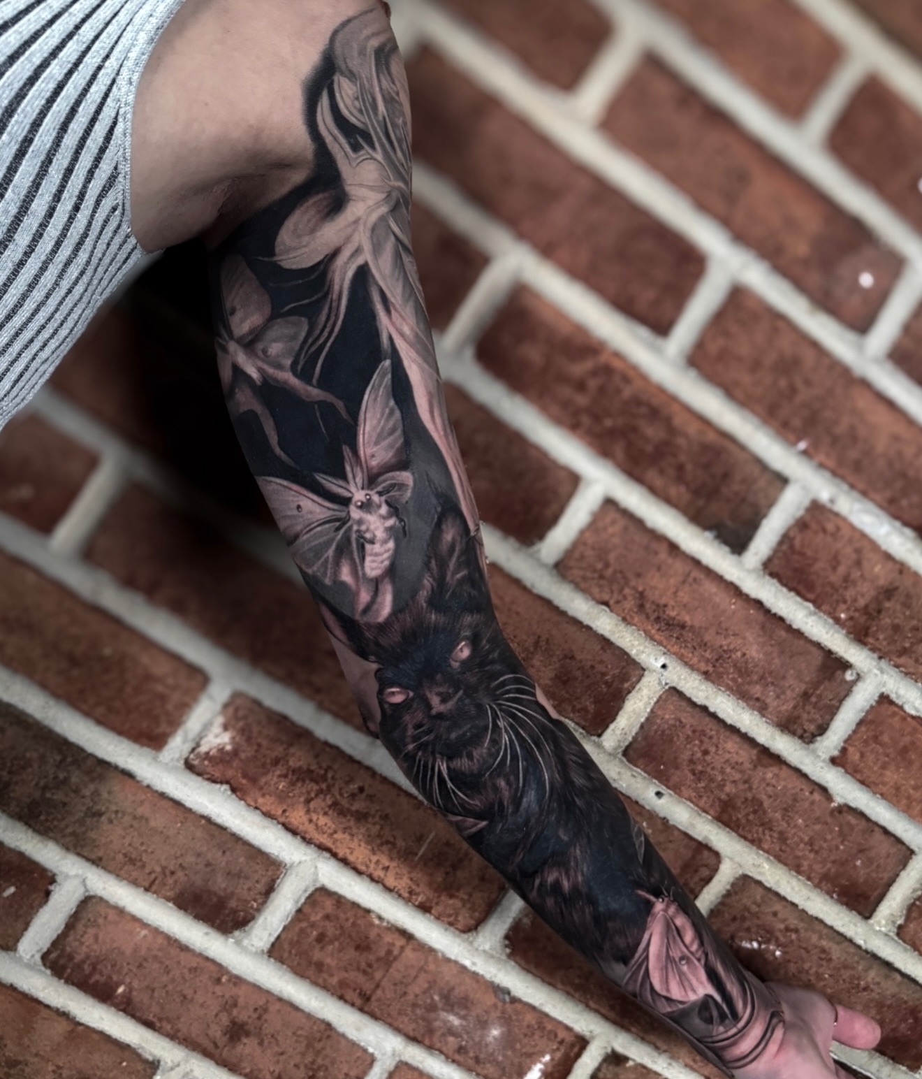 Tattoo by @sunseritattoo — black_and_grey, realism