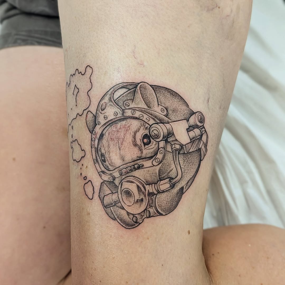 Animal in diving helmet realism tattoo on the forearm by DONEL 📍Denver