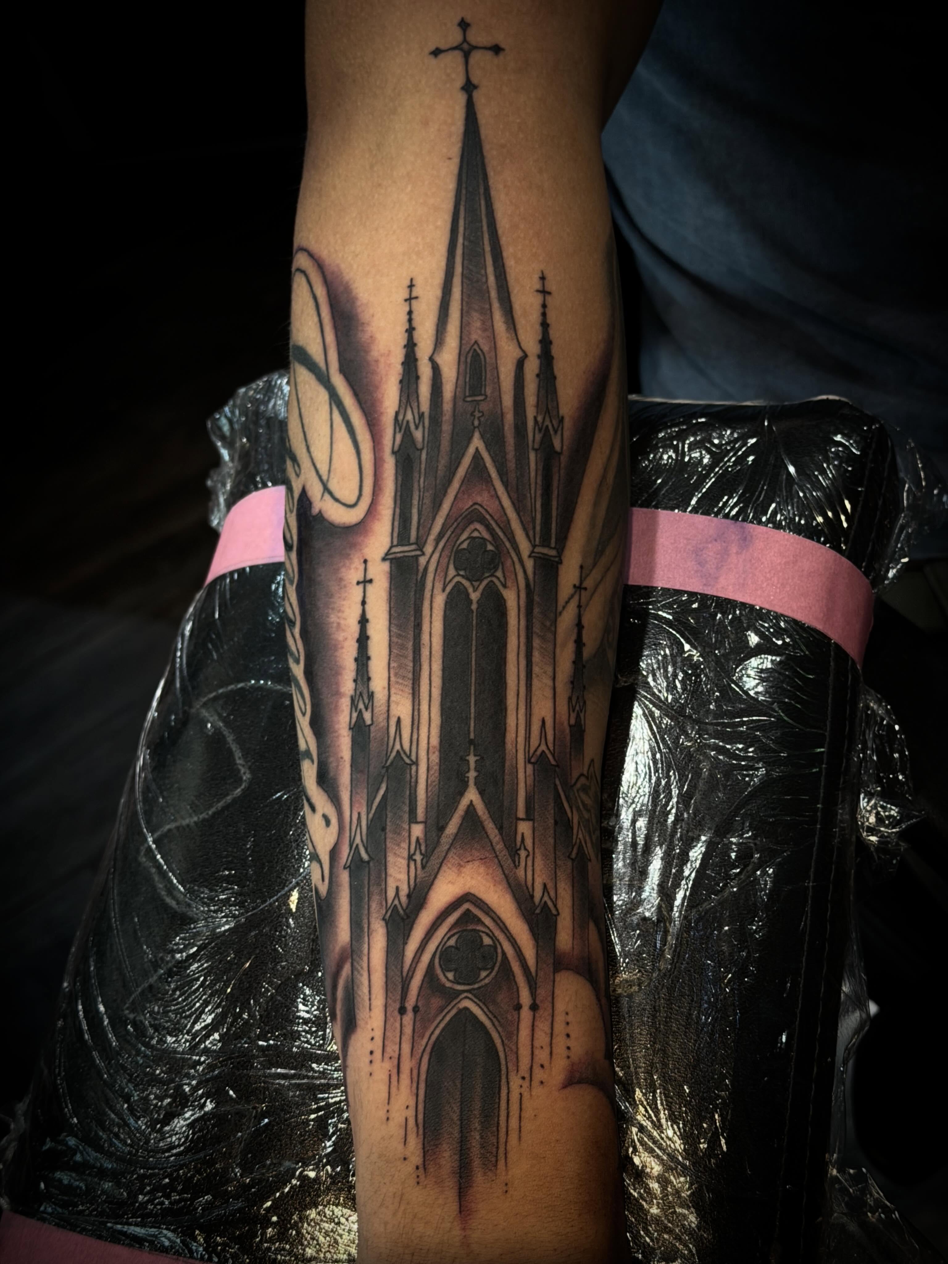 Gothic cathedral black and grey tattoo on the forearm by Cory Haberman
