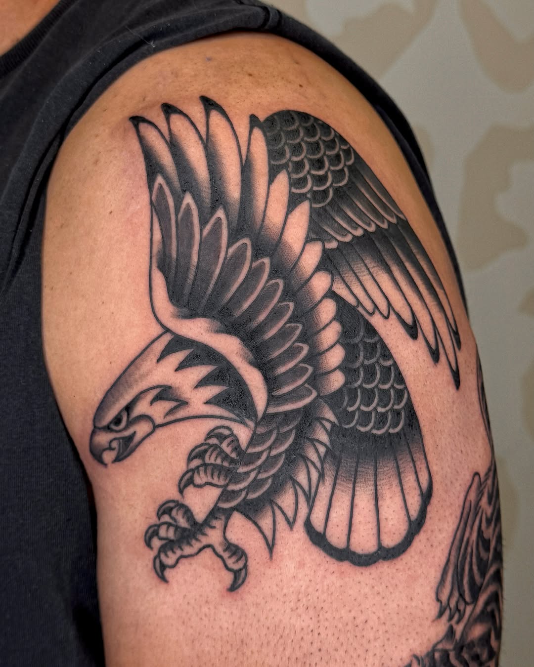 Eagle black and grey tattoo on the shoulder by Bre Grover, Vancouver, British Columbia