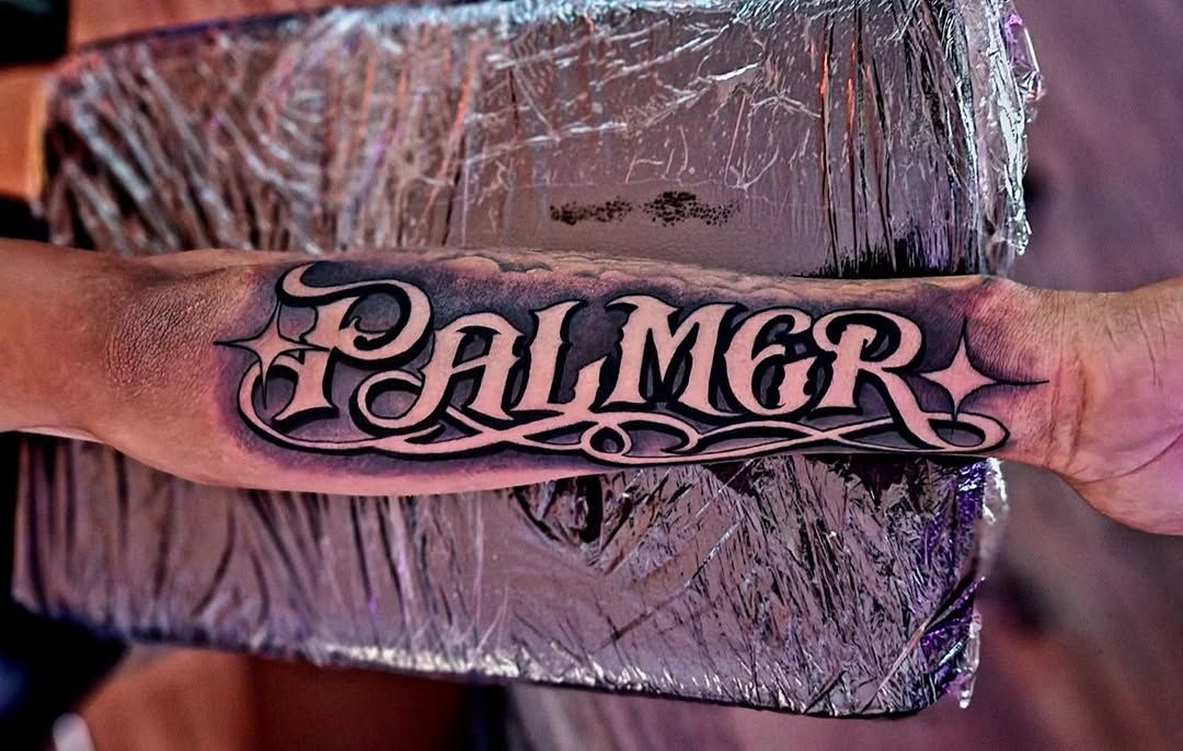 Palmer name tattoo lettering tattoo on the forearm by Luke Jordan Ink, Louisville, Colorado