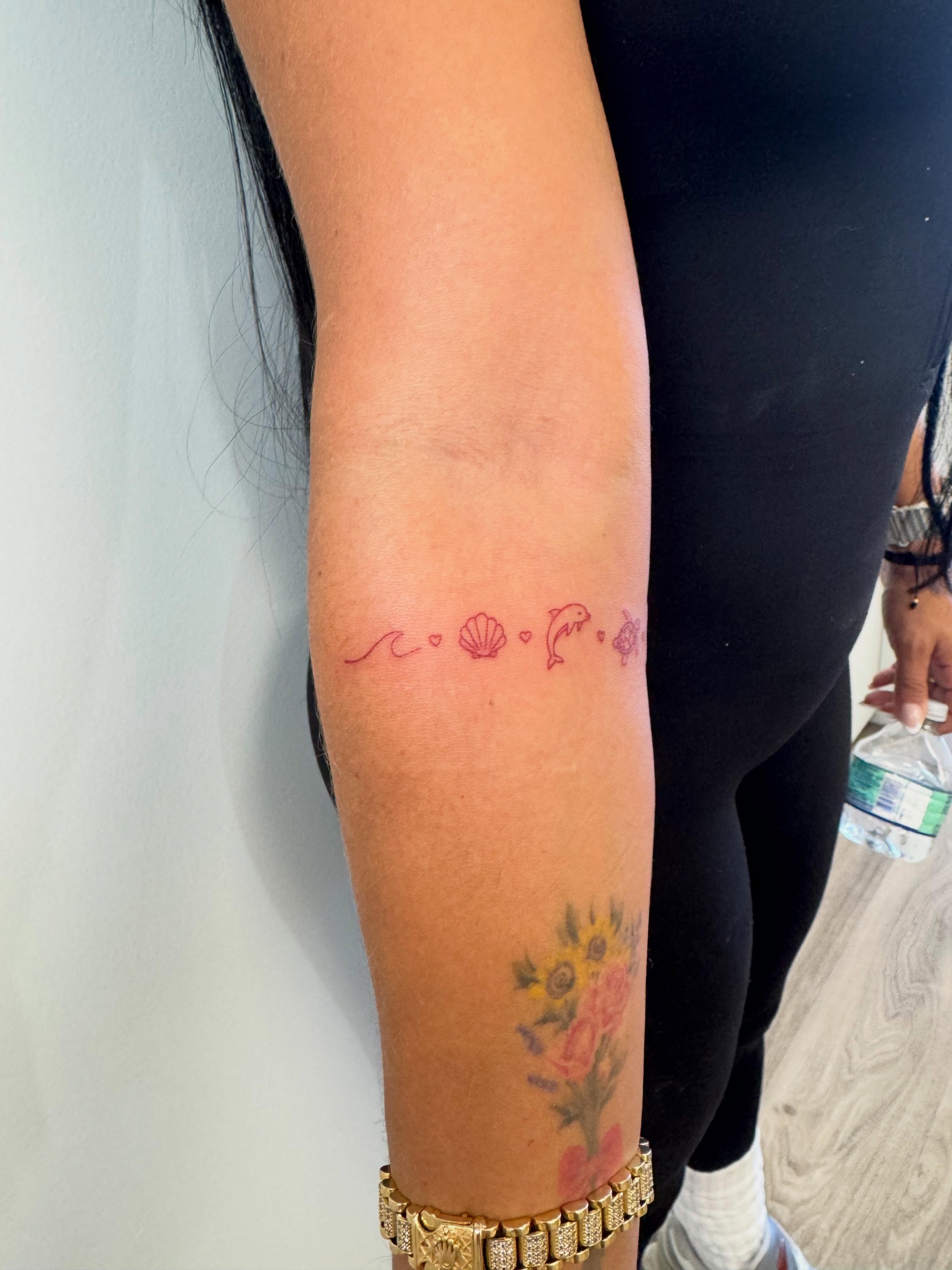 Nautical symbols fine line tattoo on the forearm by Angela Nery, South Jordan, Utah