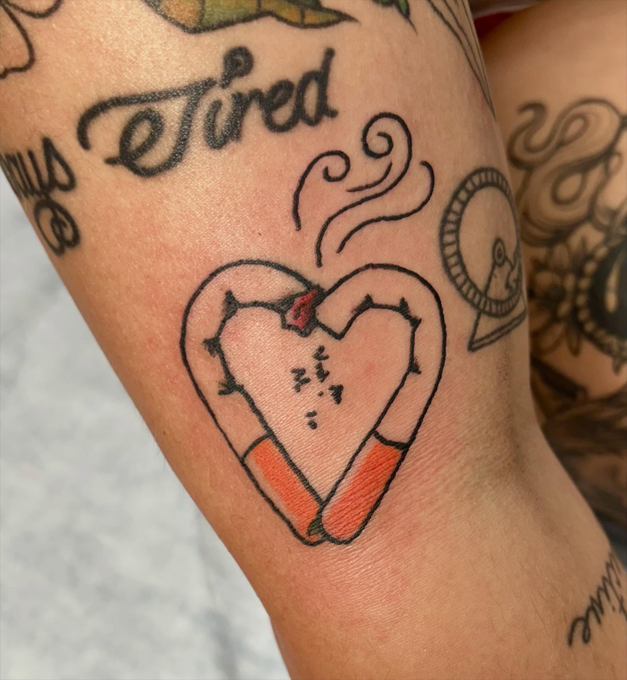 Heart with cigarette American traditional tattoo on the forearm by ✮ ✄ star ✮ ✄