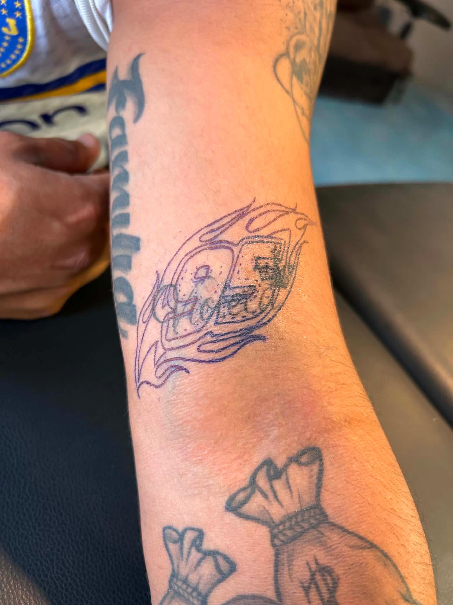 Helicopter black and grey tattoo on the forearm by Tu SanchoTattoos
