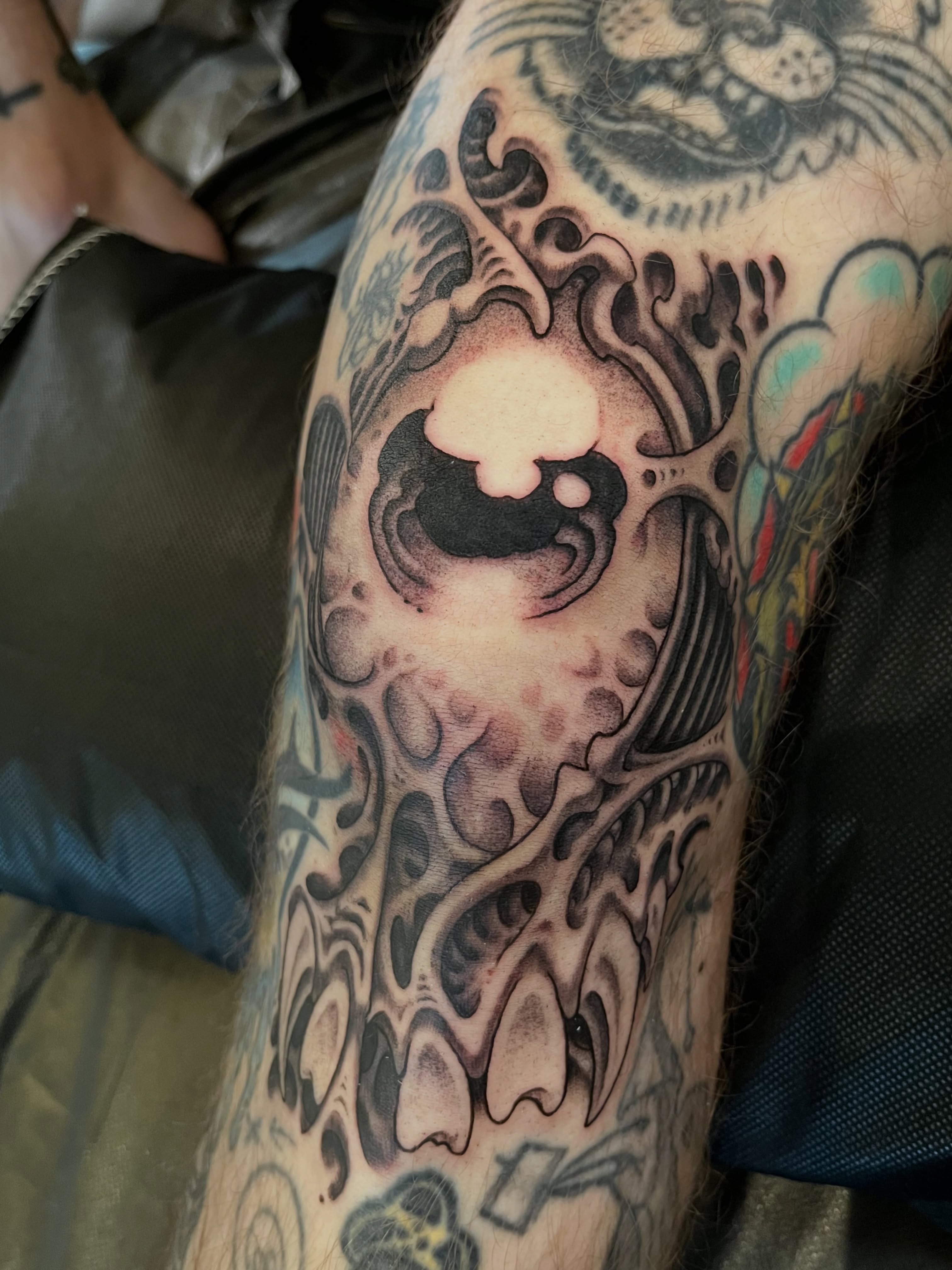 Abstract design black and grey tattoo on the forearm by Campbell Zane Alexander