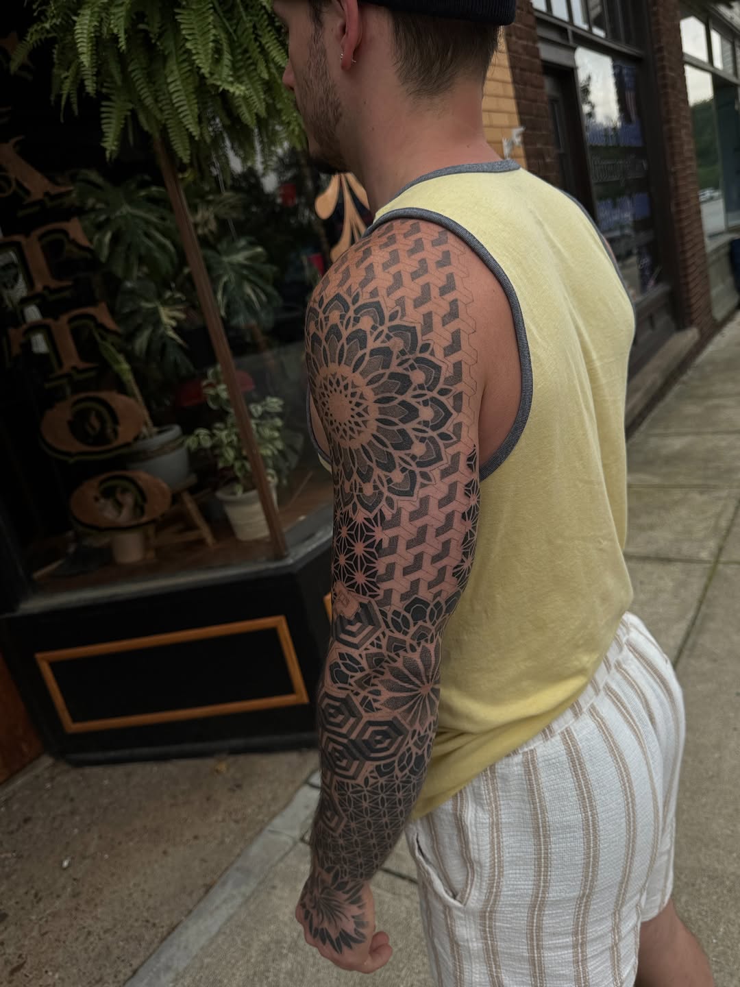 Tattoo by @chrisirvintattoos — geometric, dotwork