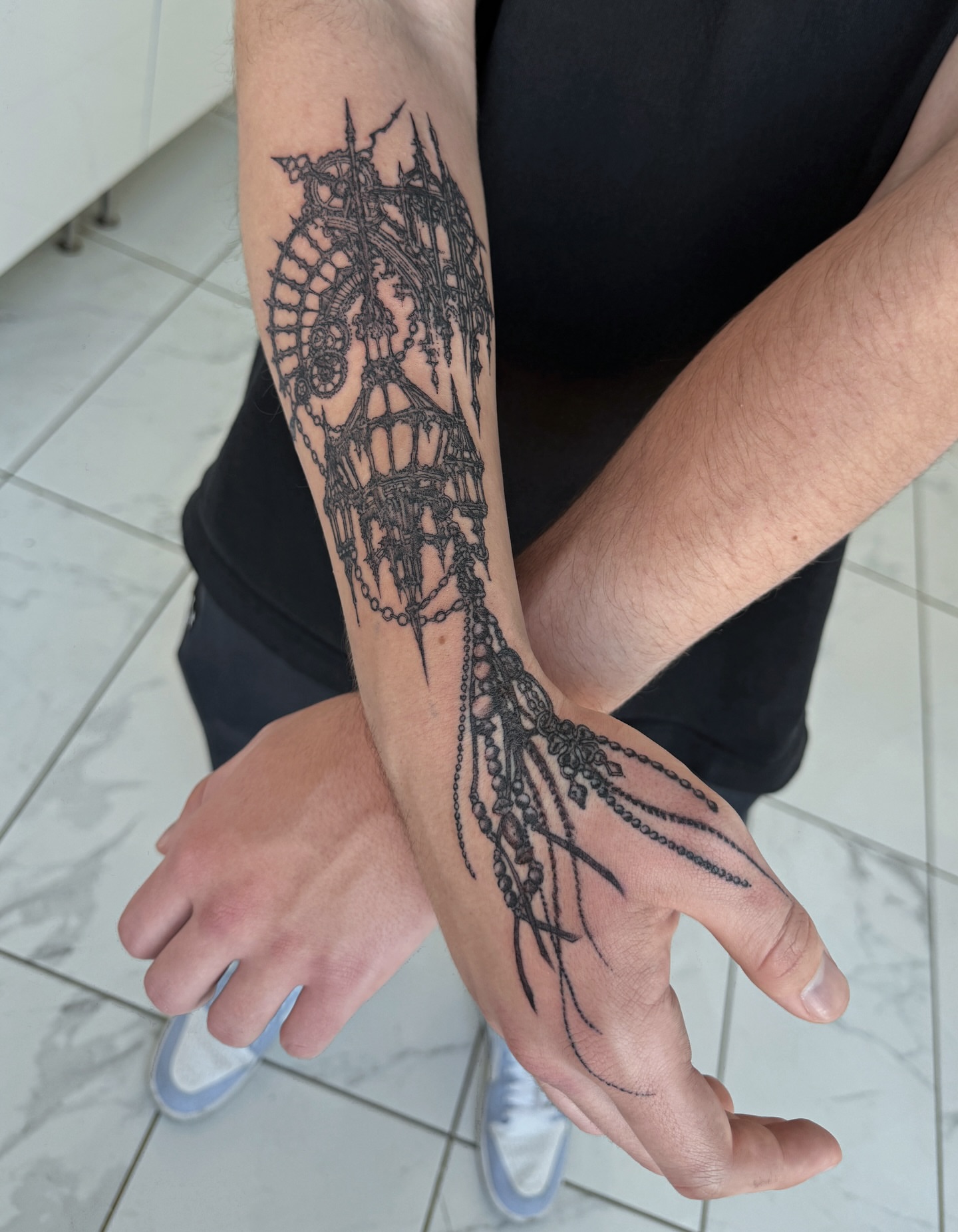Ship black and grey tattoo on the forearm by Penelope