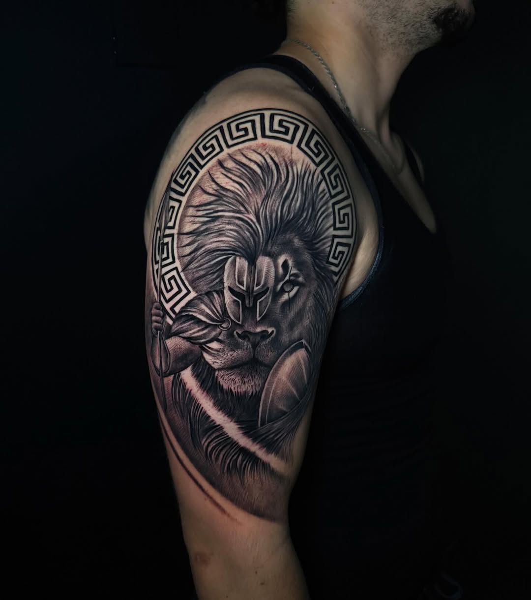 Lion with Spartan helmet and shield realism tattoo on the shoulder by George Maldonado Austin, Austin, Texas