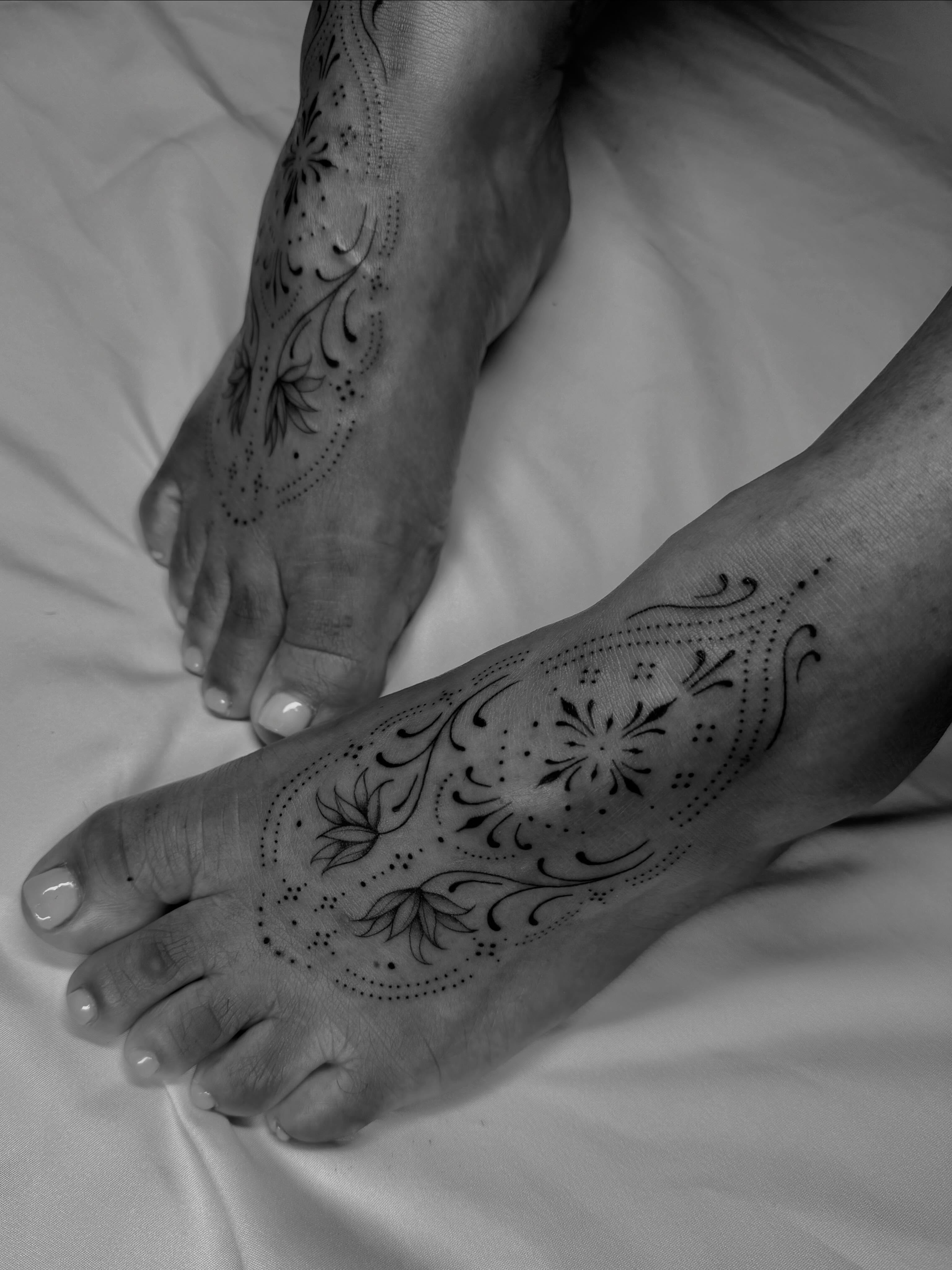 Floral pattern dotwork tattoo on the foot by ꕥ LANA MOON TATU ꕥ
