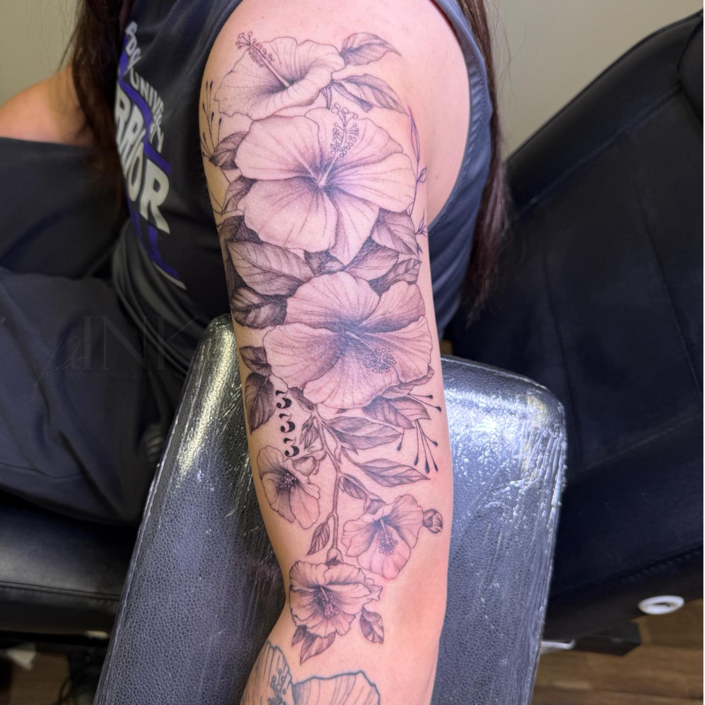 Hibiscus flowers realism tattoo on the forearm by PxINK, Crystal, Minnesota