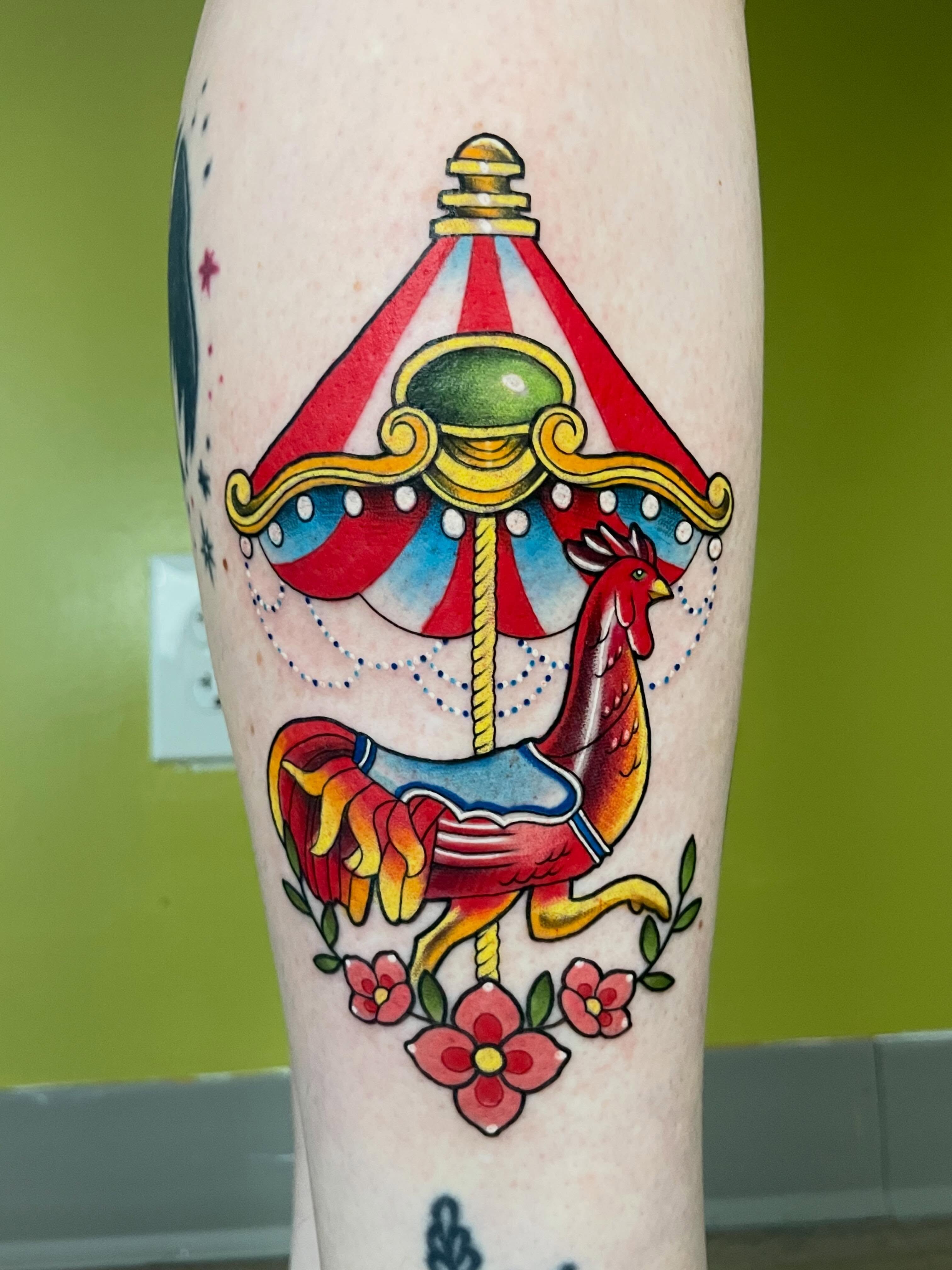 Carousel and rooster American traditional tattoo on the forearm by ✨Erin Haines✨