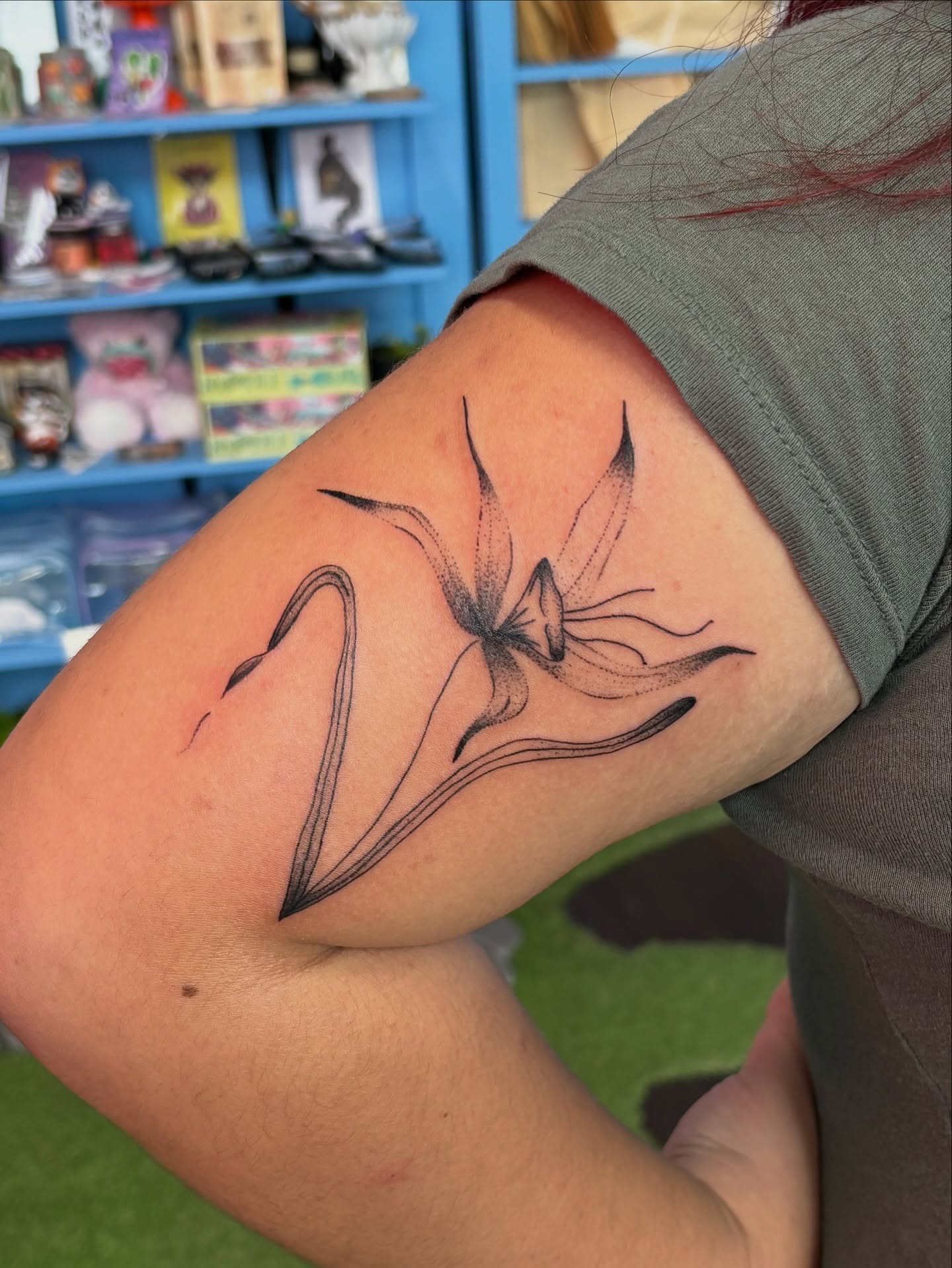 Lily dotwork tattoo on the forearm by carla sofia