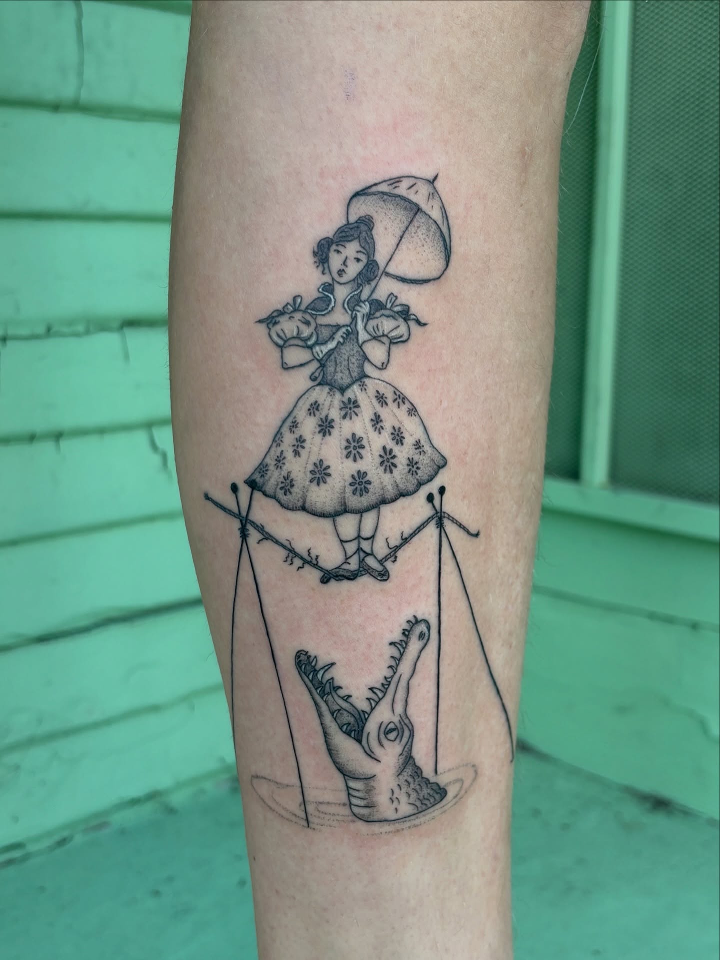 Girl with umbrella realism tattoo on the forearm by carla sofia