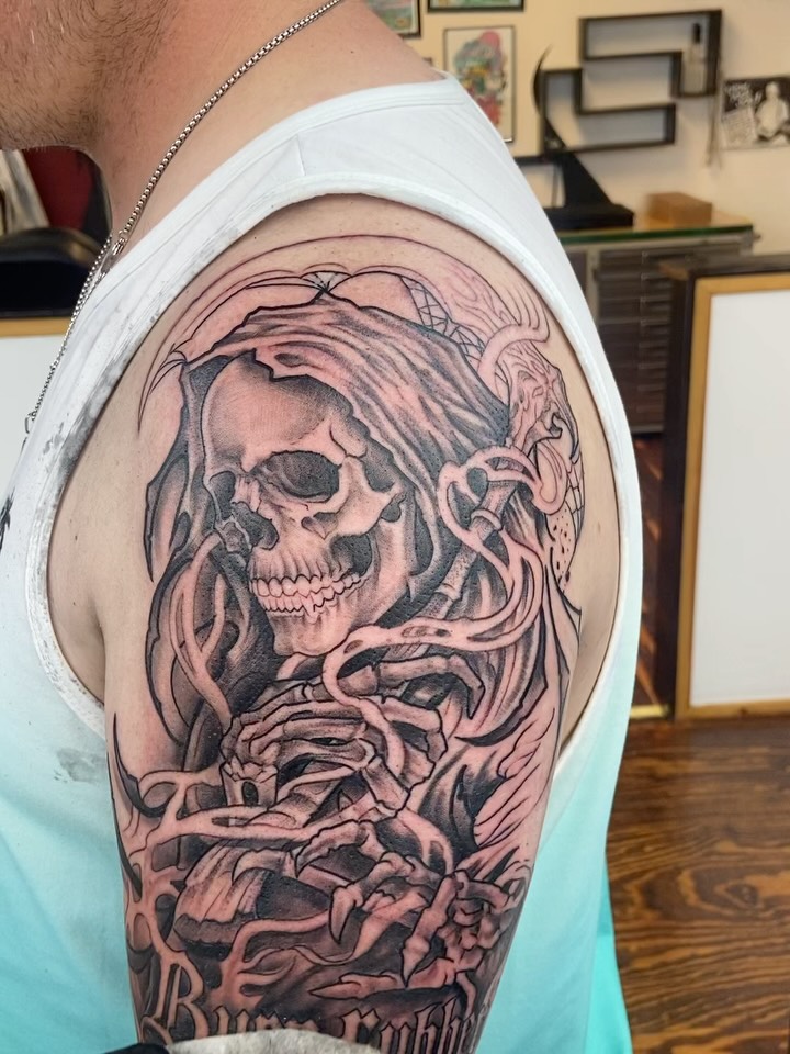 Grim reaper skull realism tattoo on the shoulder by Sam Hearnen, Lawrence, Kansas