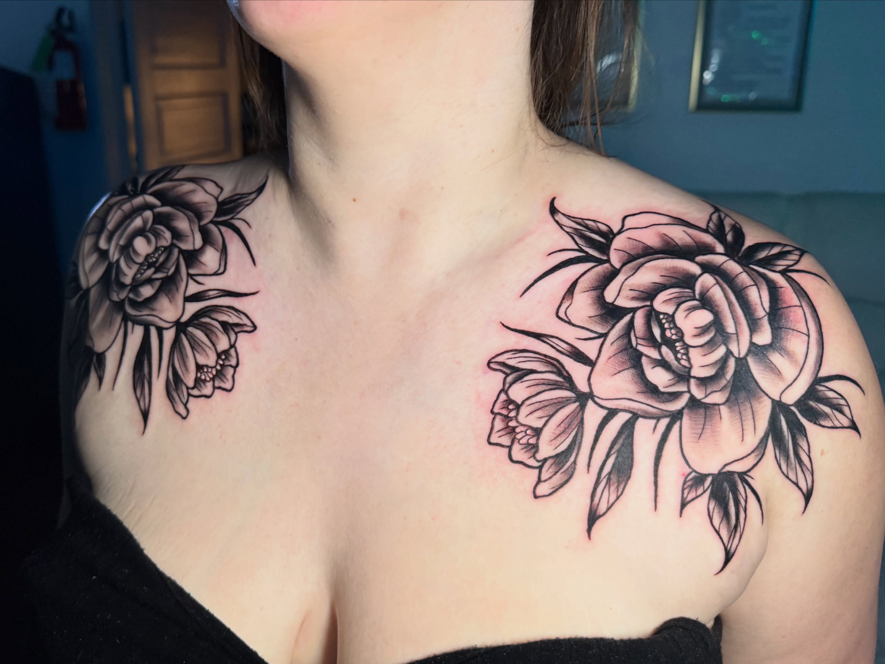 Roses black and grey tattoo on the shoulder by Quentin Stevenson, Slidell, Louisiana