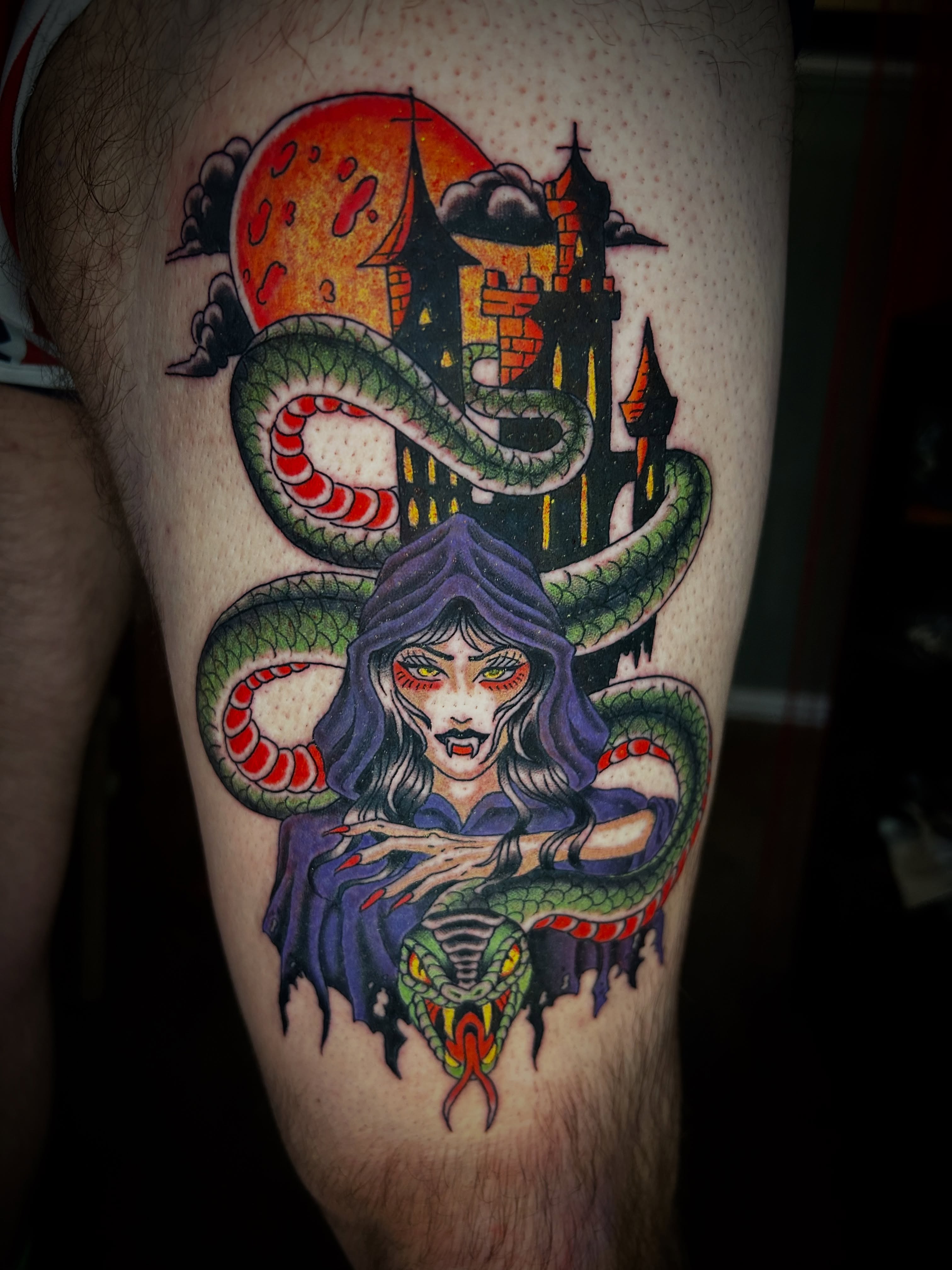 Witch and snake American traditional tattoo on the thigh by Kurt, Somerville, Massachusetts