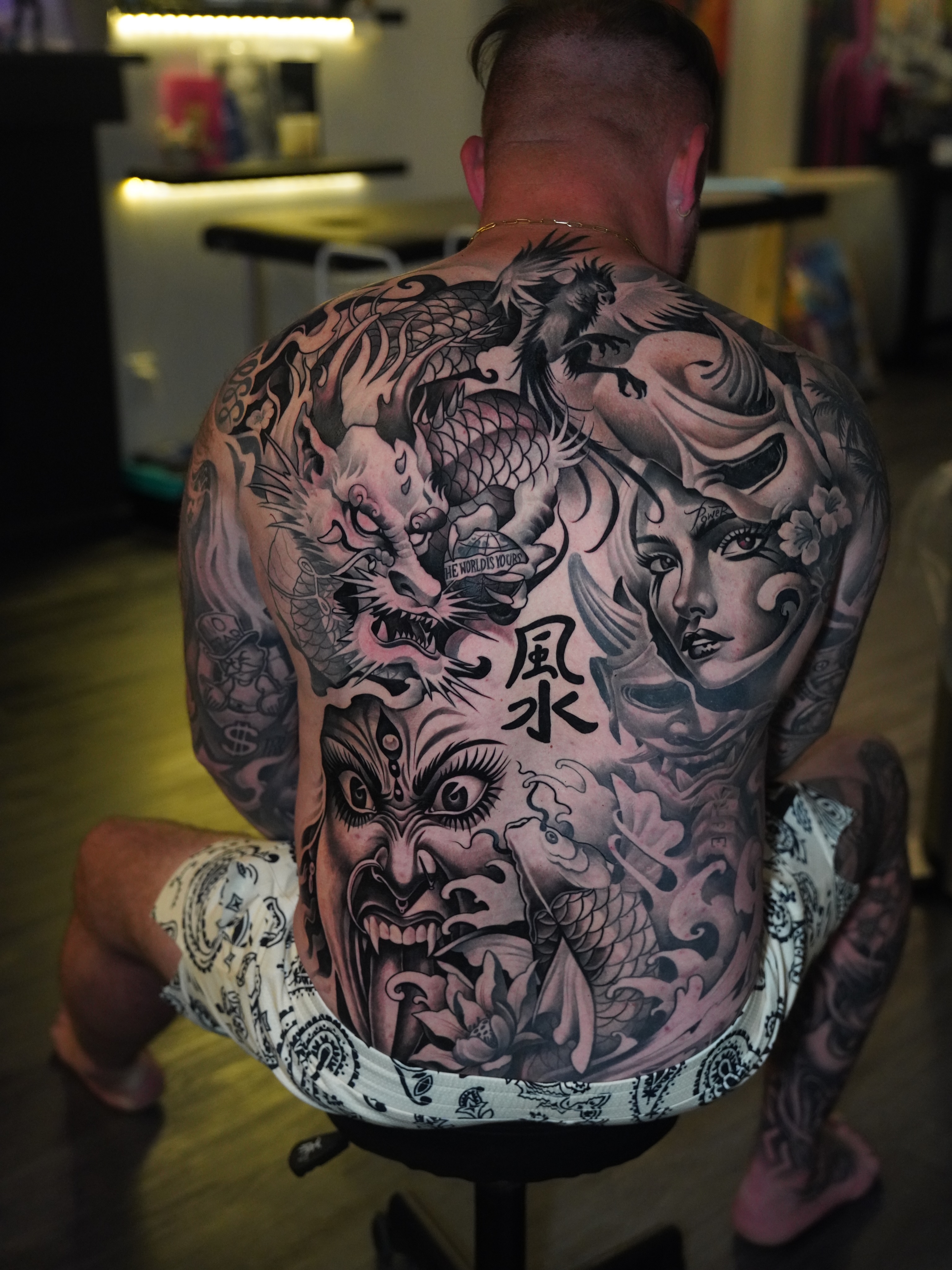 Dragon and woman japanese irezumi tattoo on the back by Artem Kunakuzin