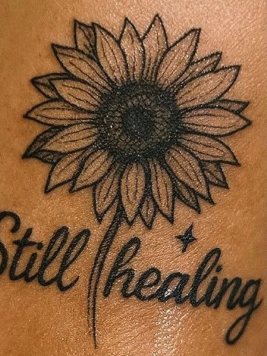 Sunflower and script ignorant tattoo on the forearm by Tatz By Benji