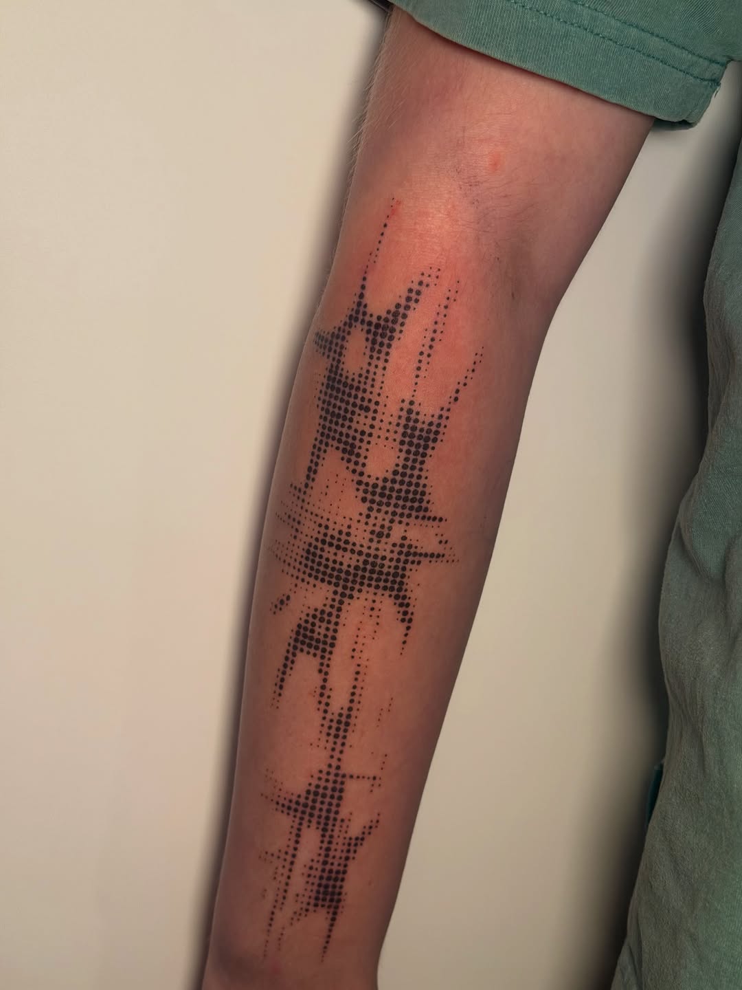 Abstract sound wave pattern dotwork tattoo on the forearm by Alaska
