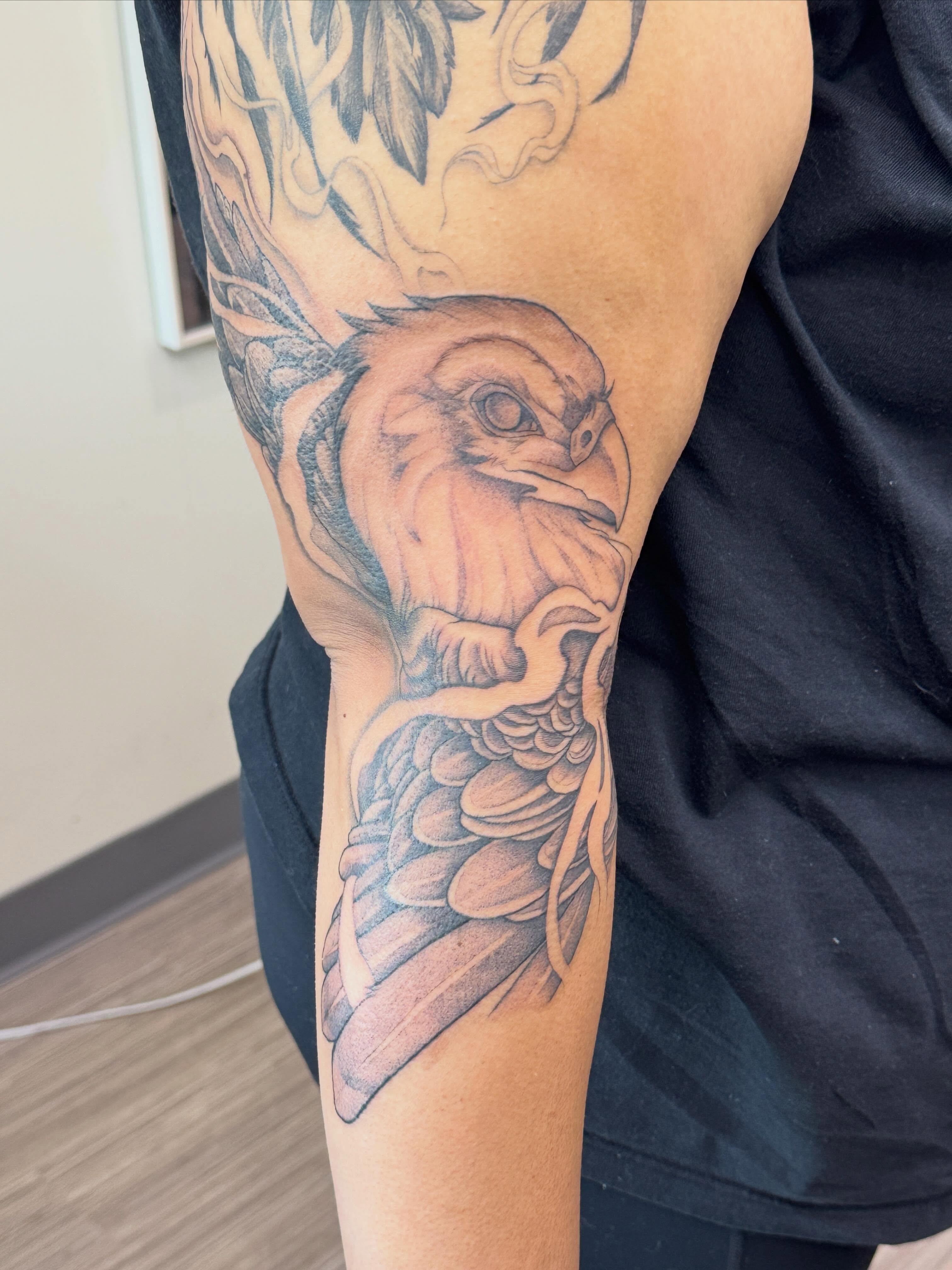 Hawk realism tattoo on the forearm by Rebecca Rose