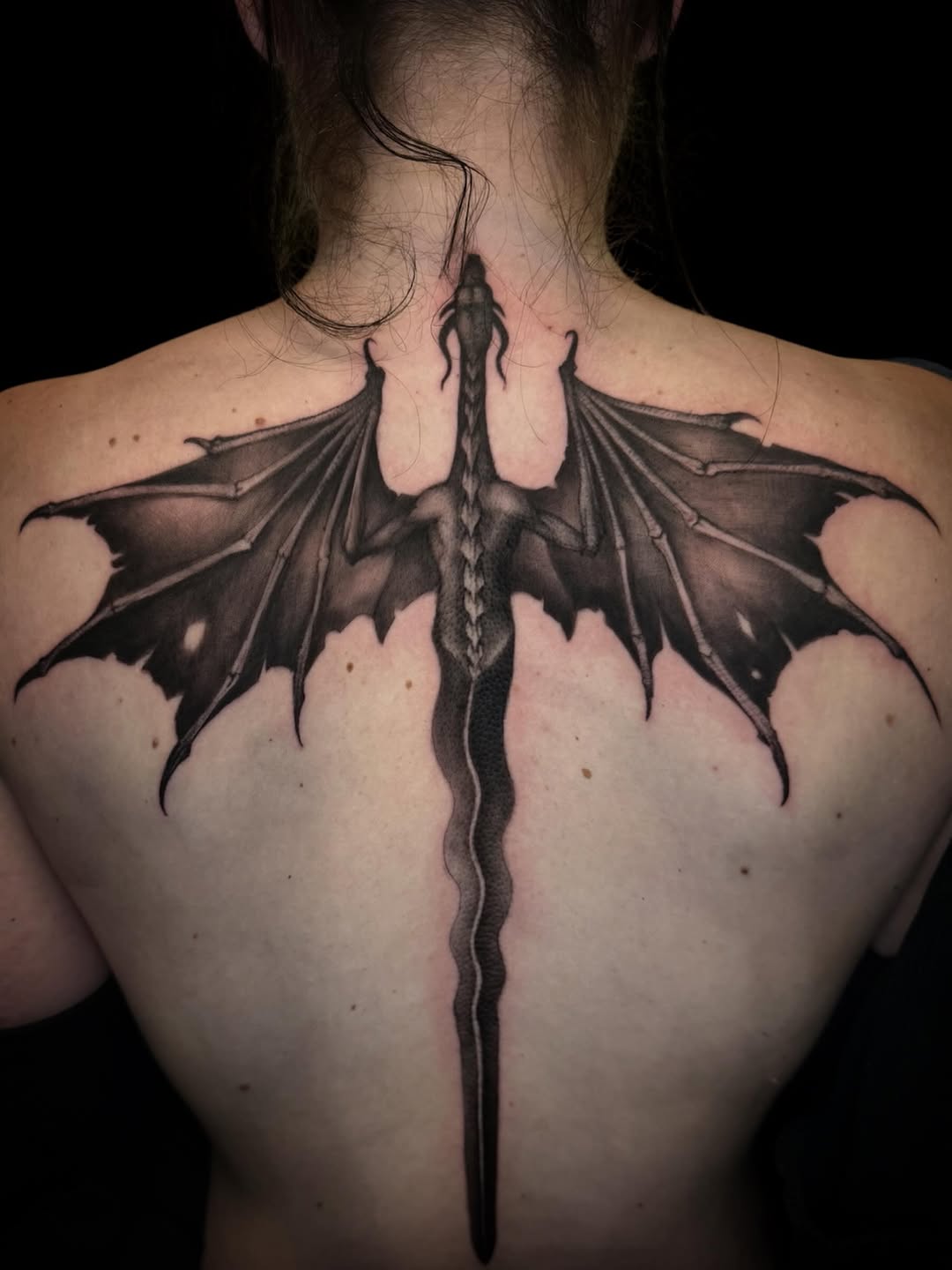 Dragon blackwork tattoo on the back by Brennan Walker, Orem, Utah