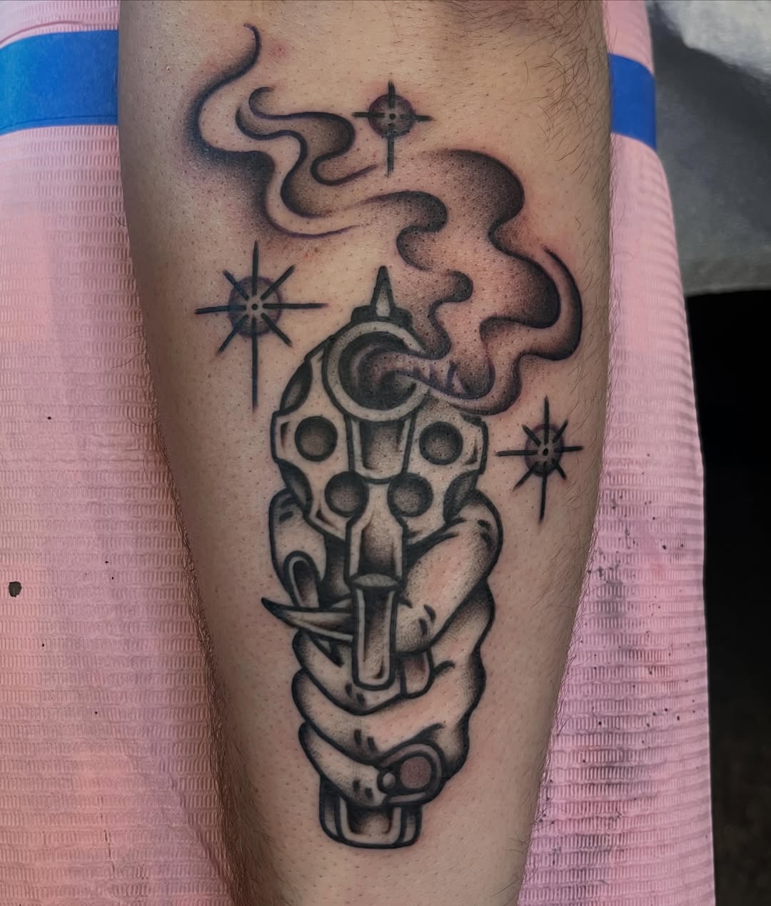Gun and snake American traditional tattoo on the forearm by Kayla Gibson, Portland, Oregon