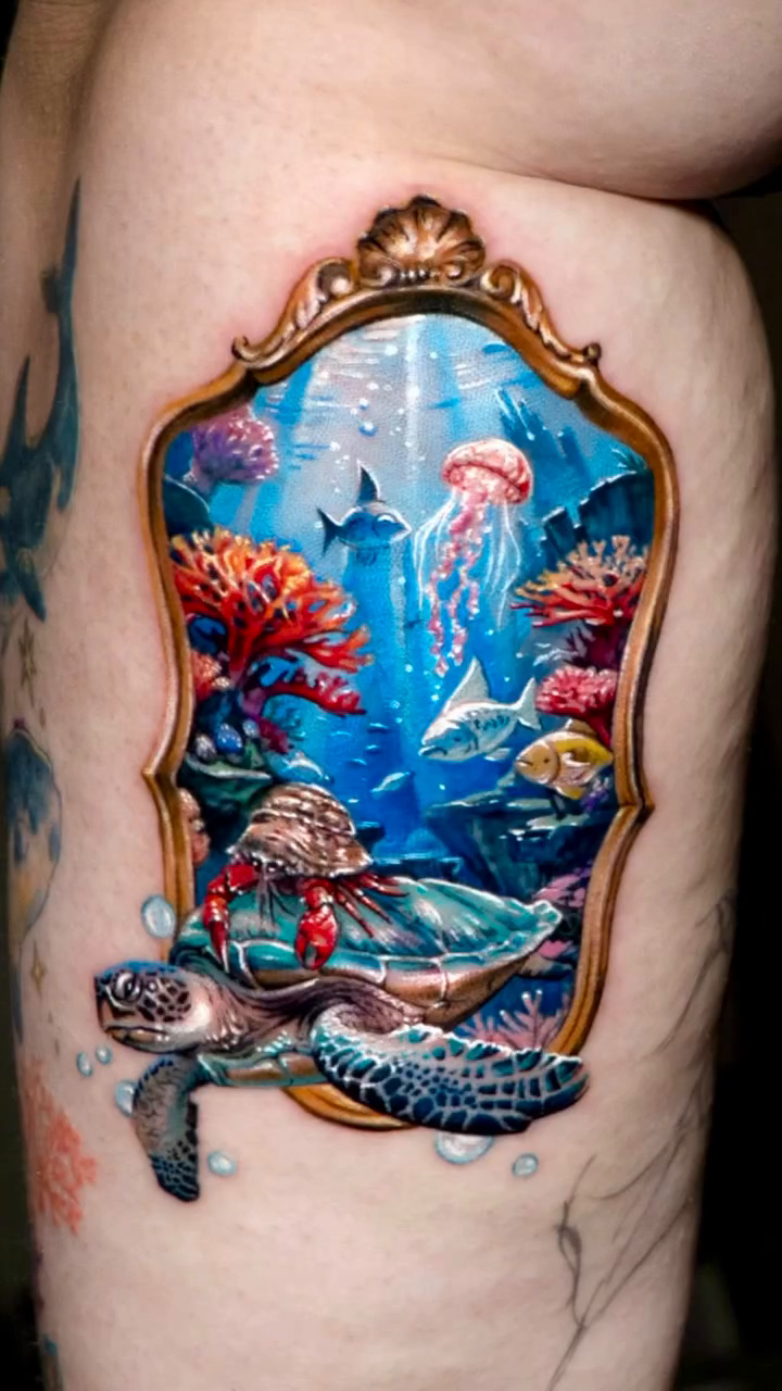 Watercolor tattoo on the upper arm by Tattooist HARRY COLOR