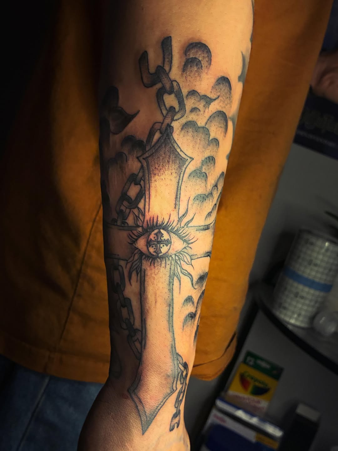 Cross with eye and chains dark art tattoo on the forearm by ɪɪɴᴋᴇᴅʙʏʀᴇɴɴ🐉