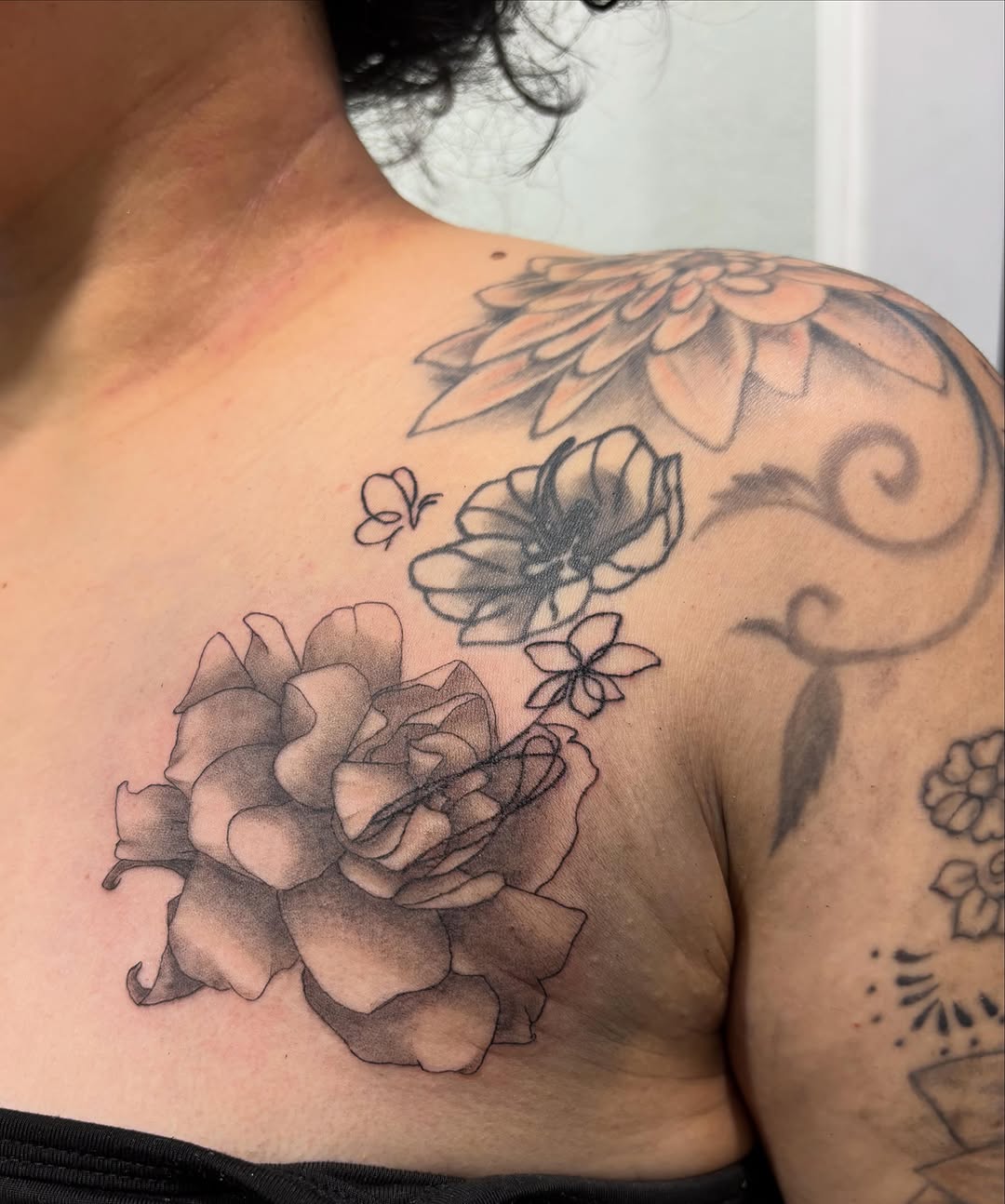Gardenia flower and butterfly dotwork tattoo on the shoulder by ✨Tattoos By Martina ✨
