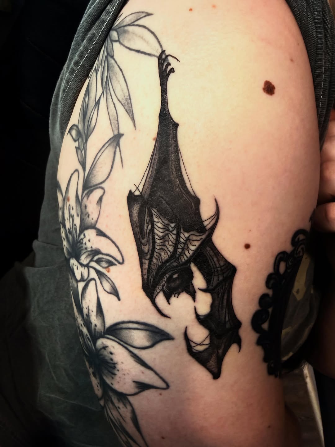 Tattoo by @justnic_ink13 — black_and_grey, dark_realism