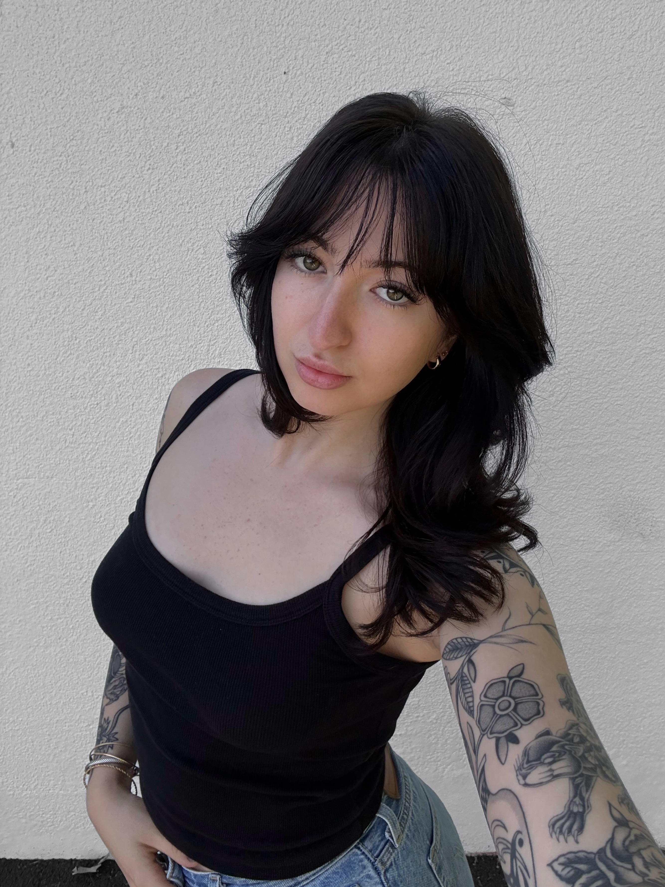 Tattooed arm black and grey tattoo on the upper arm by Ava Nilou