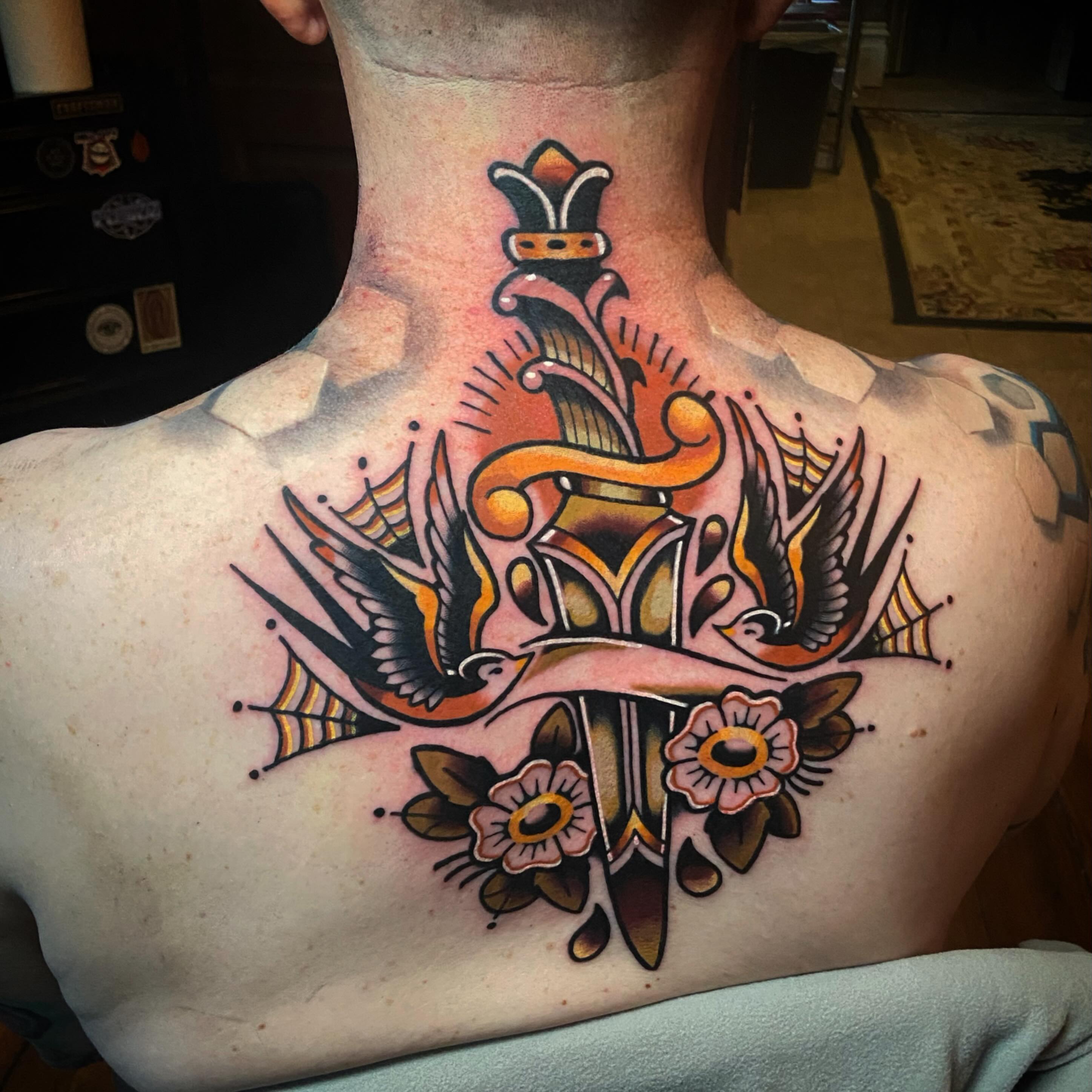 Sword and flowers American traditional tattoo on the back by Matthew Limbers⚜️