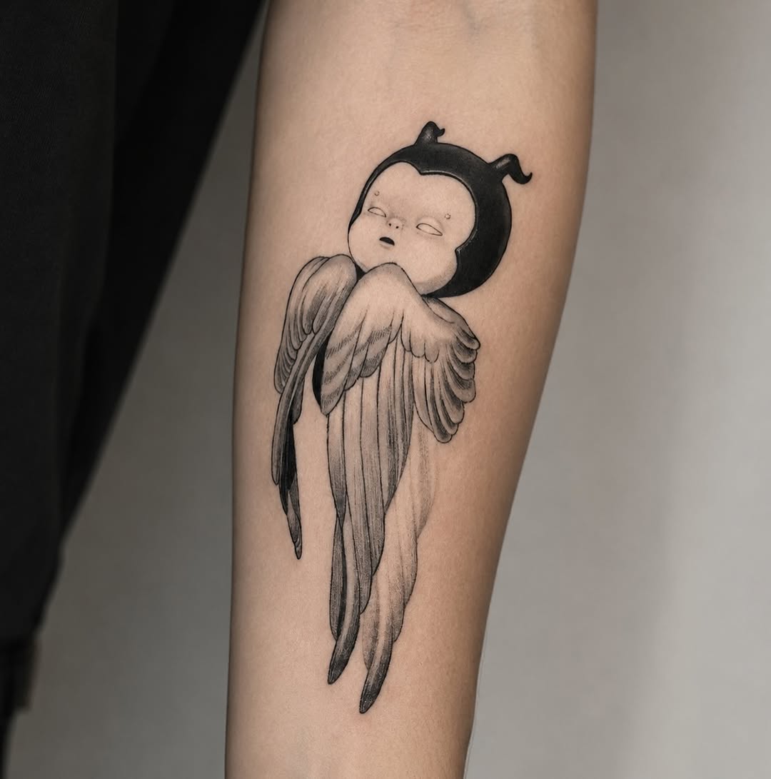 Winged baby creature realism tattoo on the forearm by Hery Anwar