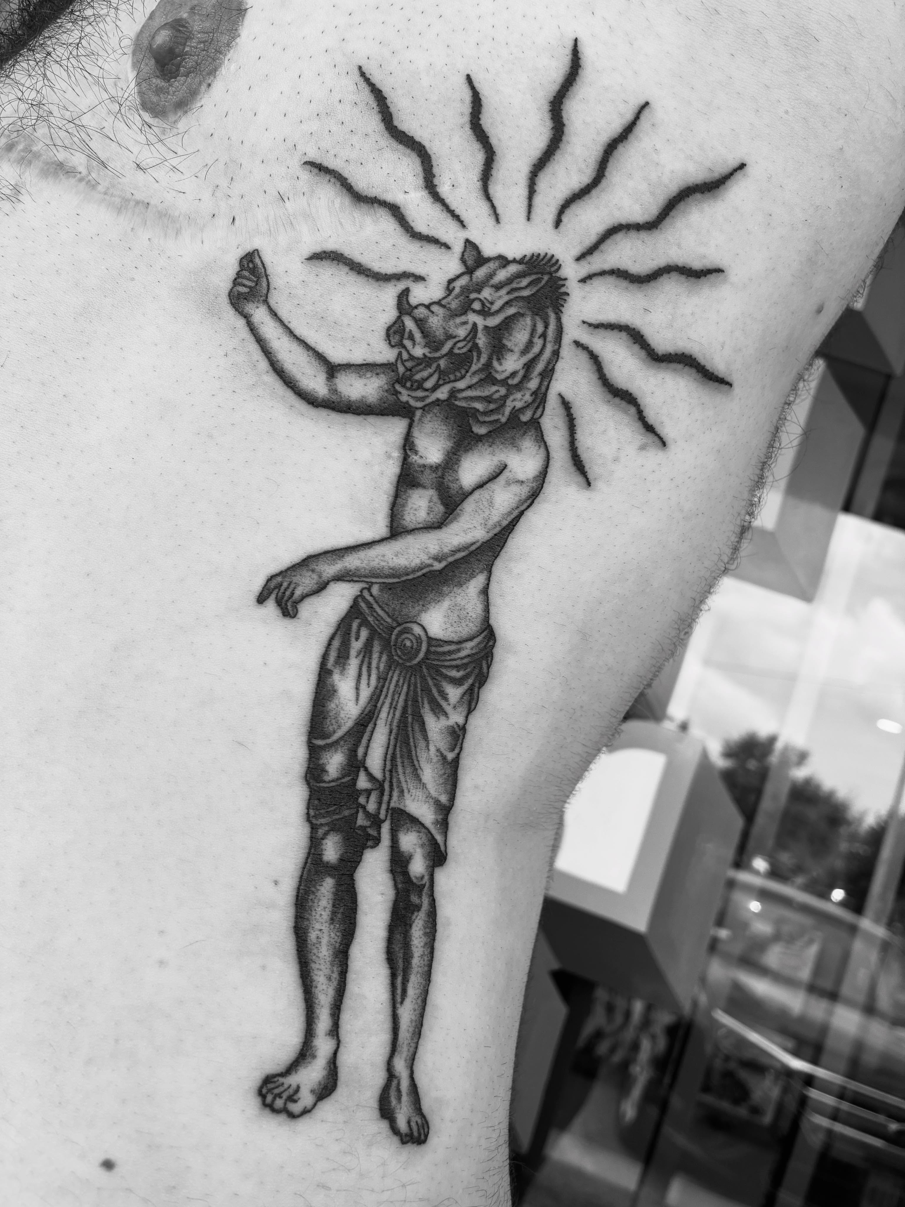 Lion-headed man dotwork tattoo on the forearm by Zachary R Bobkoff