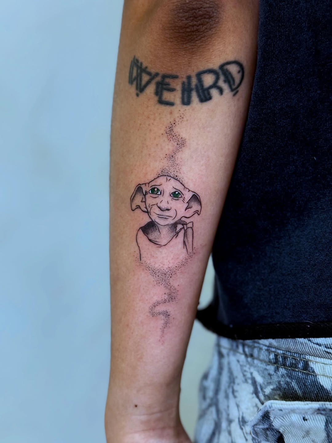 Dobby from Harry Potter tattoo on the forearm by Danny Garcia