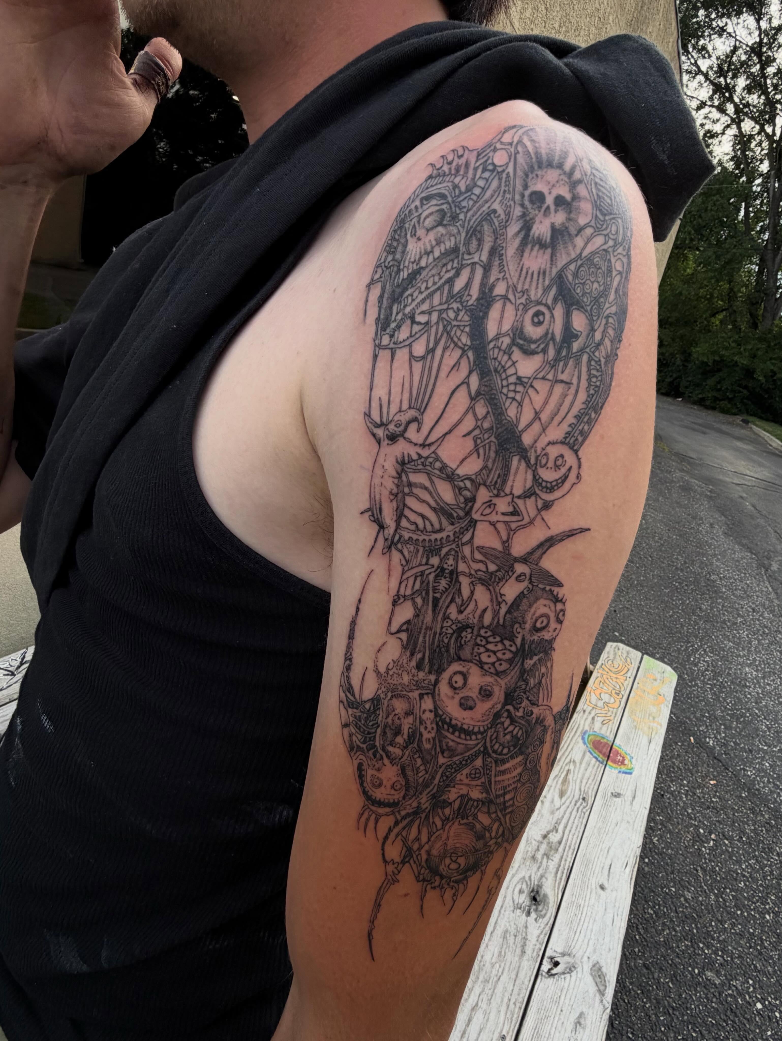 Skull and mechanical elements dark realism tattoo on the shoulder by Crawlspacecadet