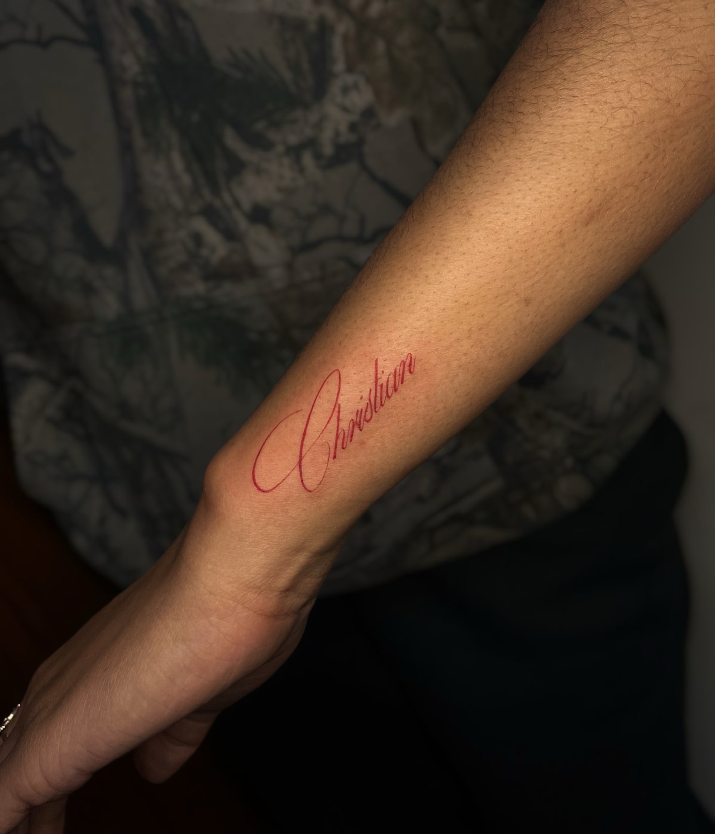 Christian lettering script tattoo on the forearm by MK