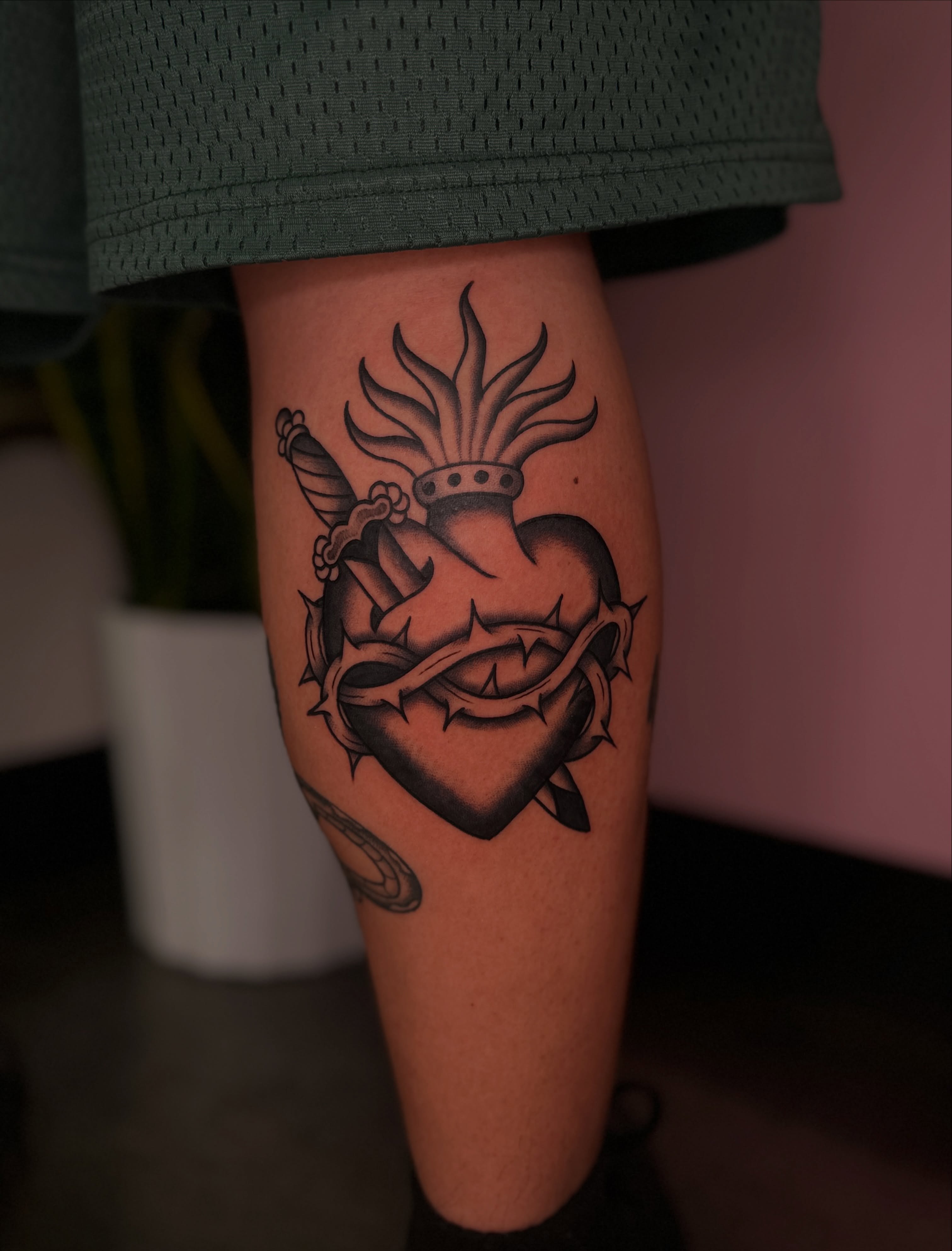 Heart with dagger black and grey tattoo on the thigh by ⊹₊⟡⋆ 𝕵𝖔𝖎𝖊 ⊹₊⟡⋆