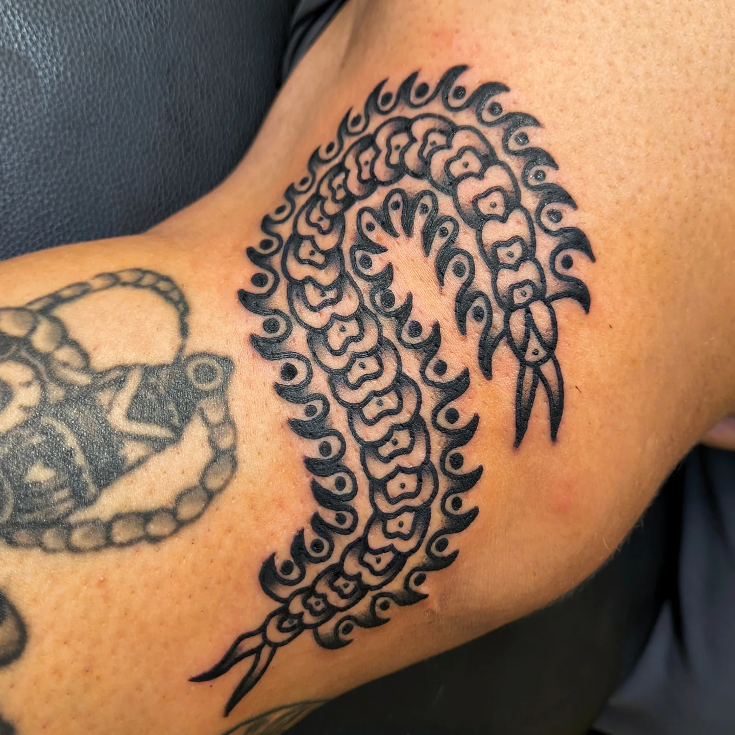 Tattoo by @pain_inks — black_and_grey
