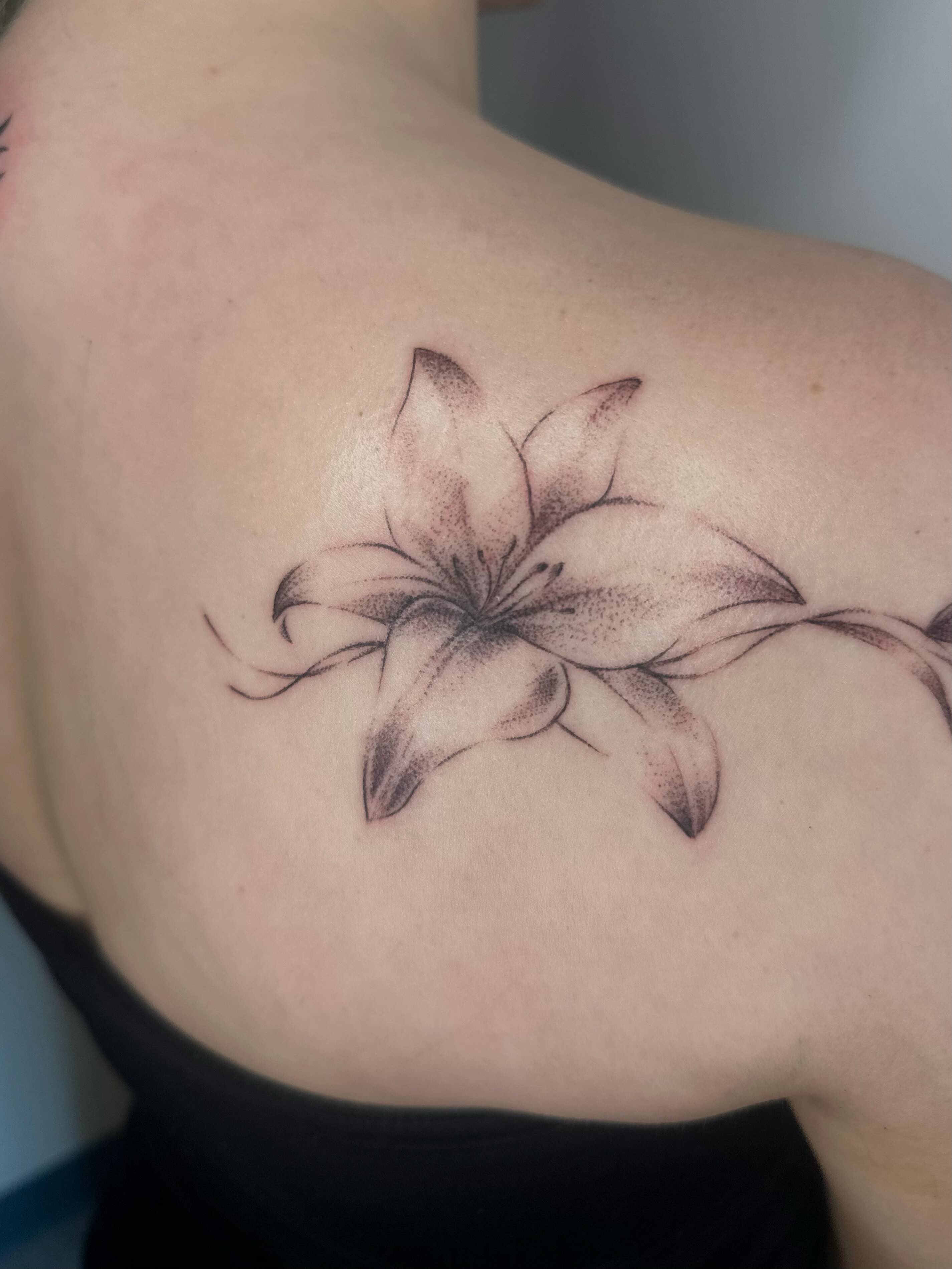 Lily dotwork tattoo on the shoulder by edie ☆ kansas tattoo artist, Lawrence, Kansas