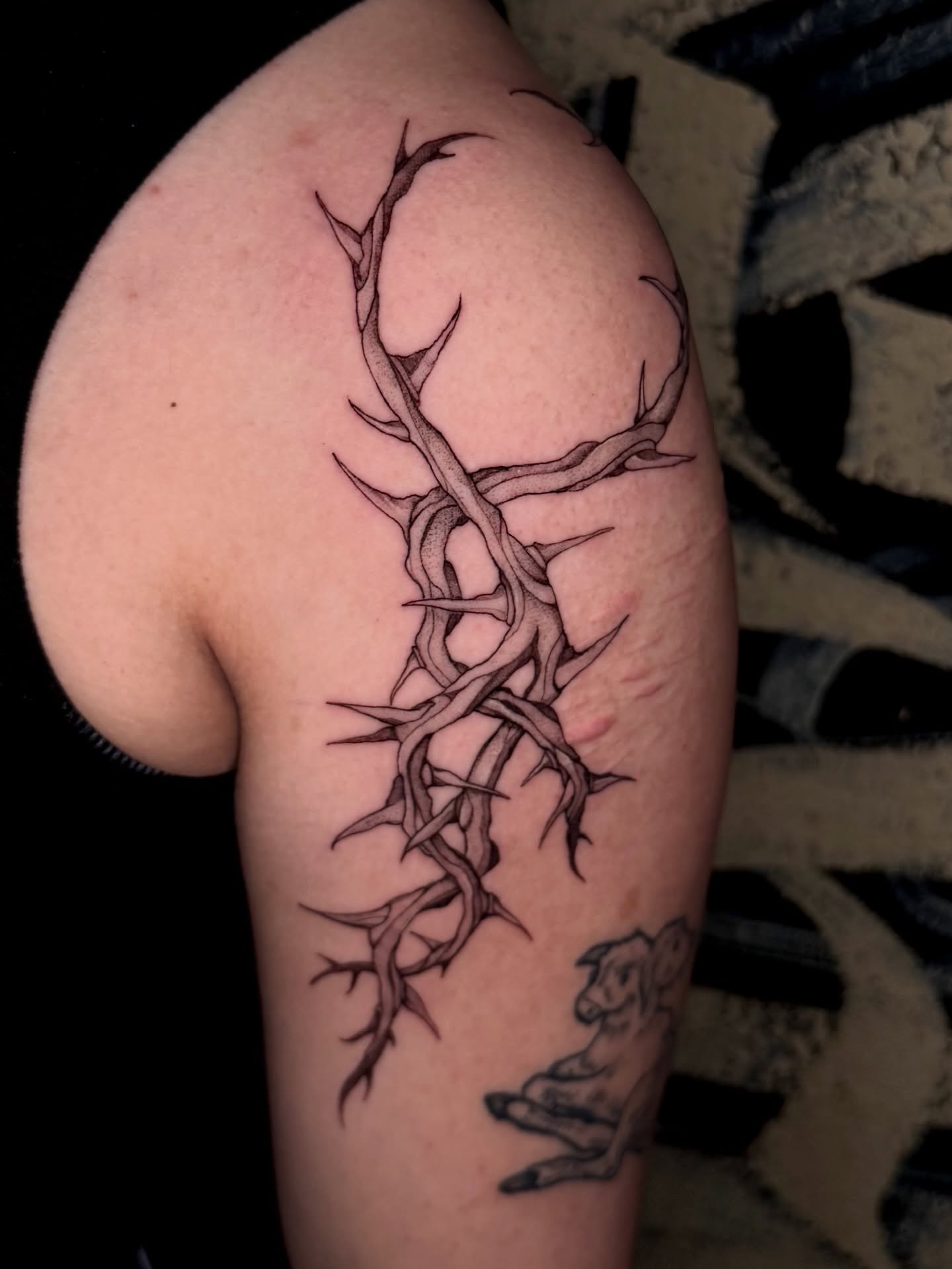 Thorn crown black and grey tattoo on the shoulder by Gillian Norland, Las Vegas, Nevada