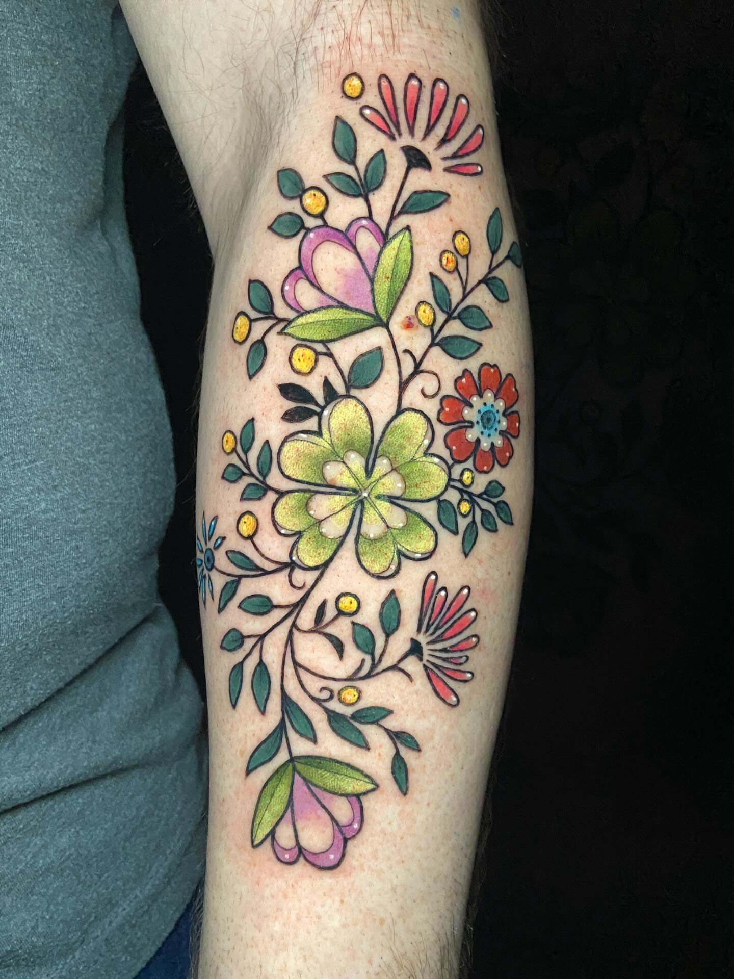 Floral arrangement new school tattoo on the forearm by Dawn Carr, Richmond, Virginia