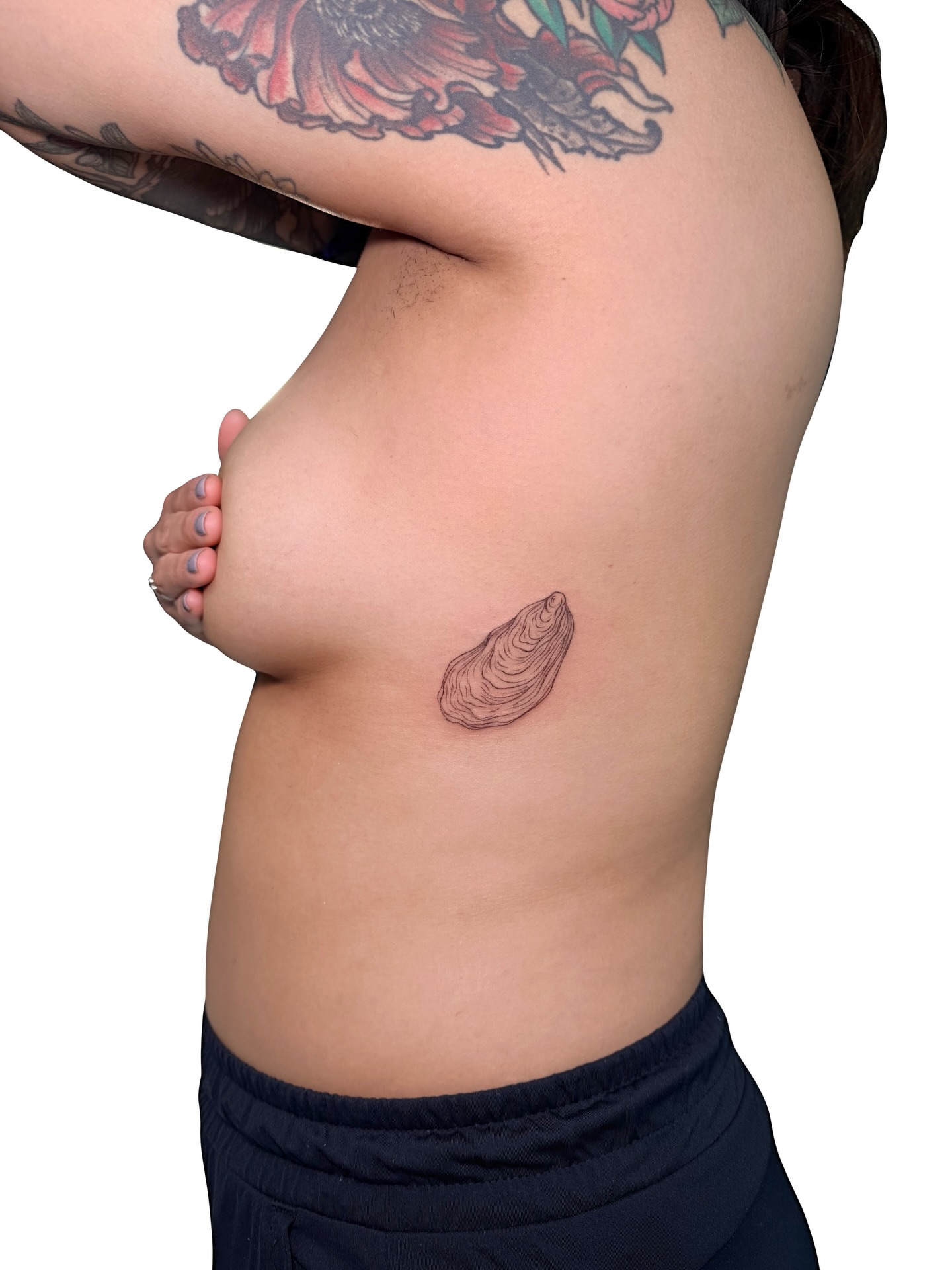 Oyster shell realism tattoo on the chest by Fionna, Seattle, Washington