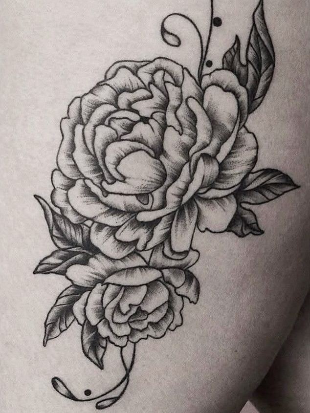Peonies dotwork tattoo on the shoulder by Yana Aizen