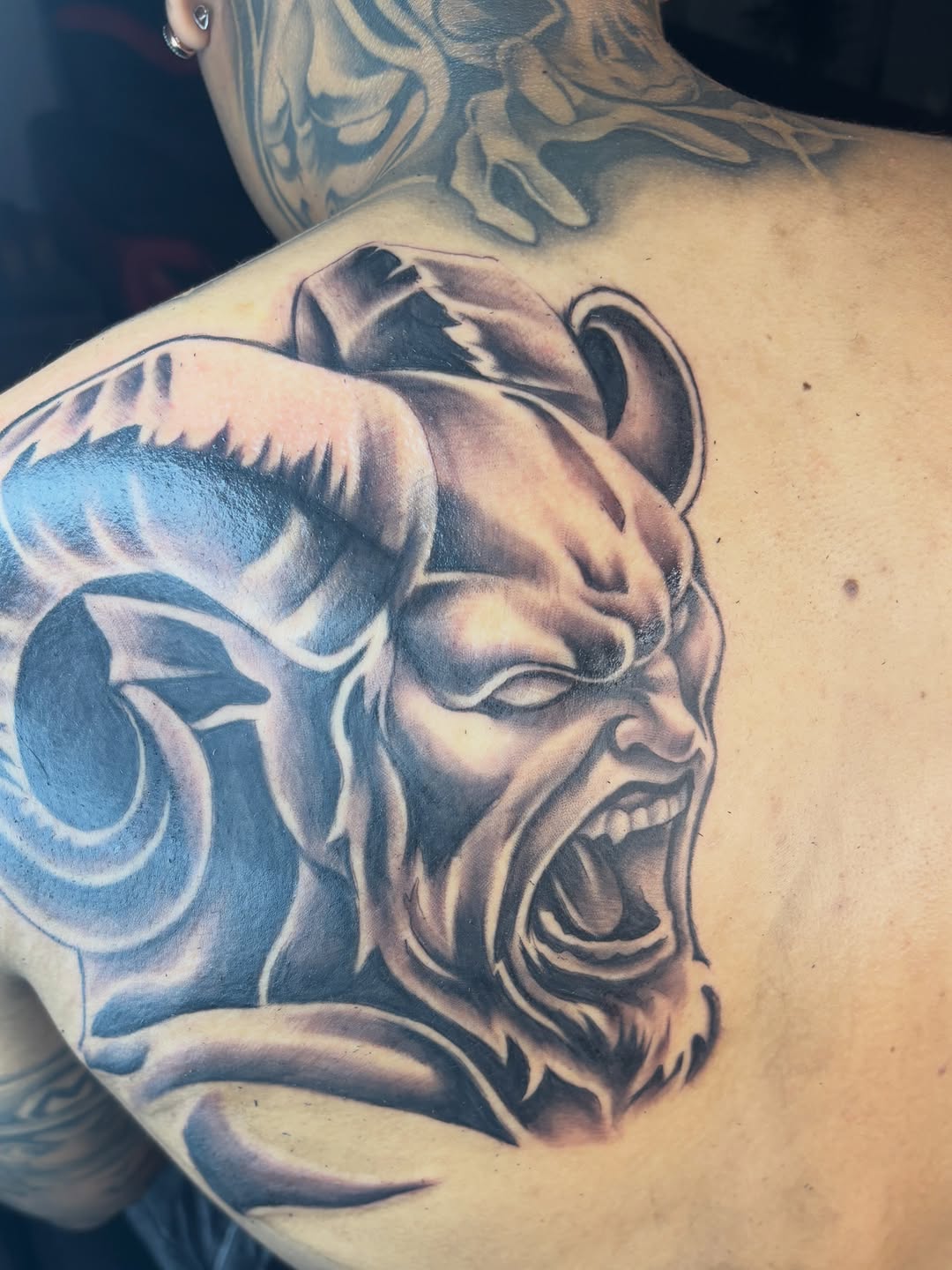 Tattoo by @10ktop_ink — realism, black_and_grey