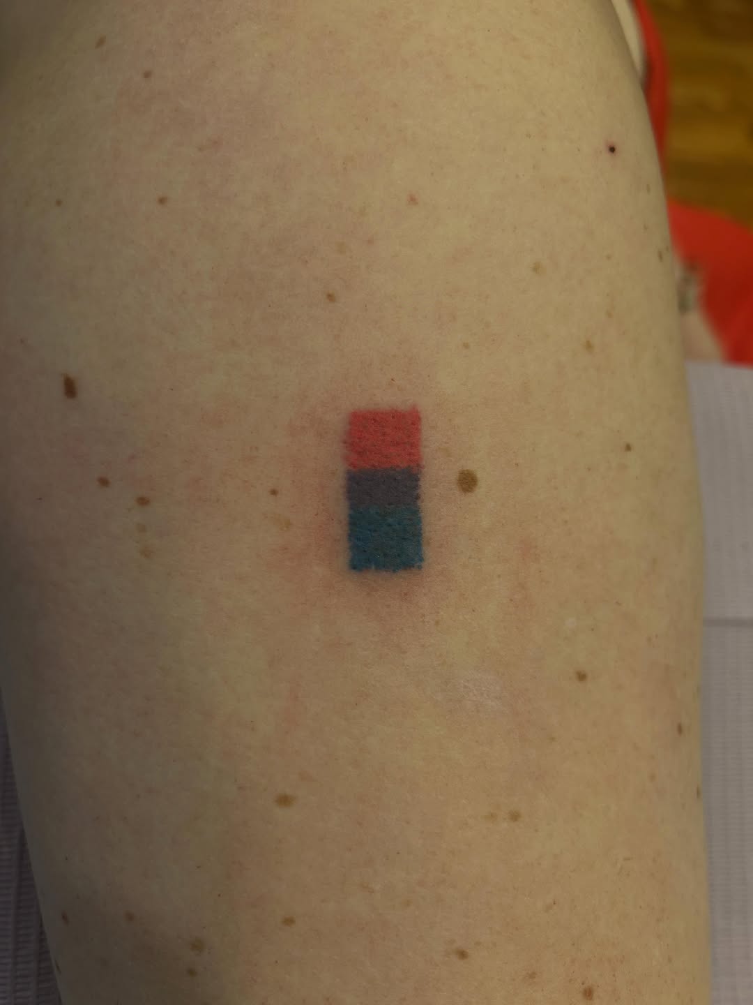 Abstract rectangle tattoo on the upper arm by Emma D