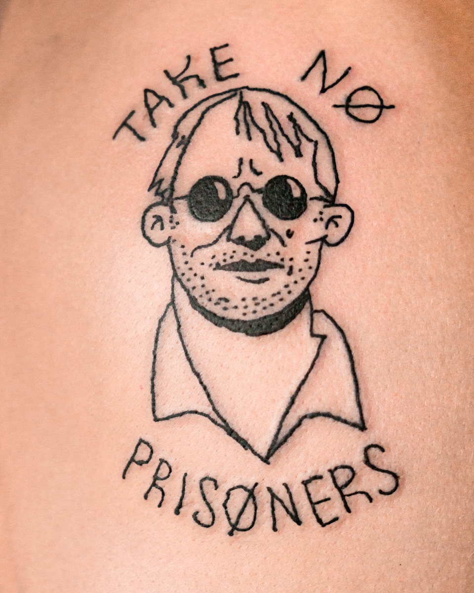 Portrait with text tattoo on the torso by Flash Boom Bang Tattoo