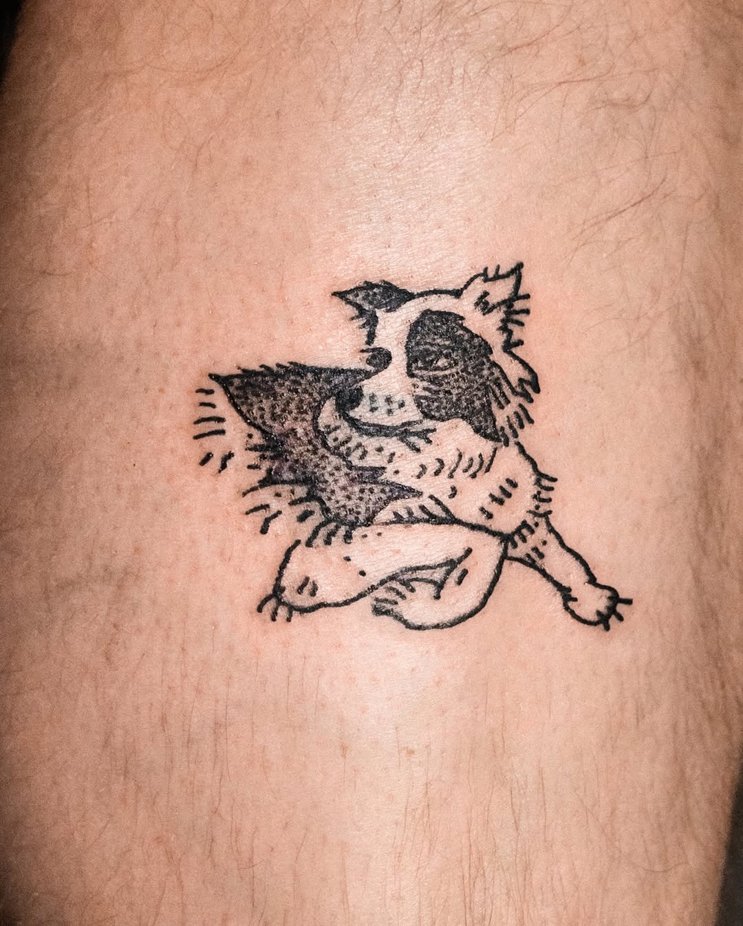 Dog fine line tattoo on the thigh by Flash Boom Bang Tattoo
